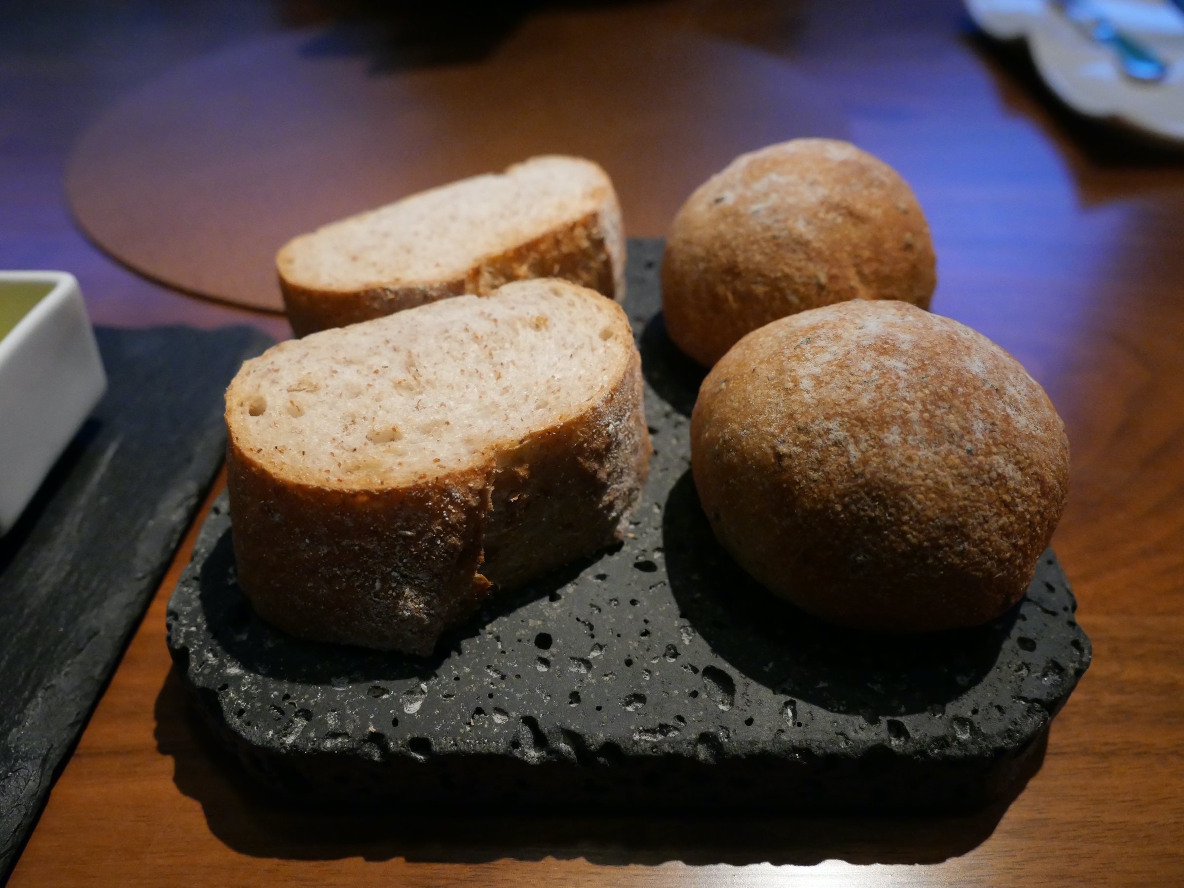 Warm bread on a lava stone.