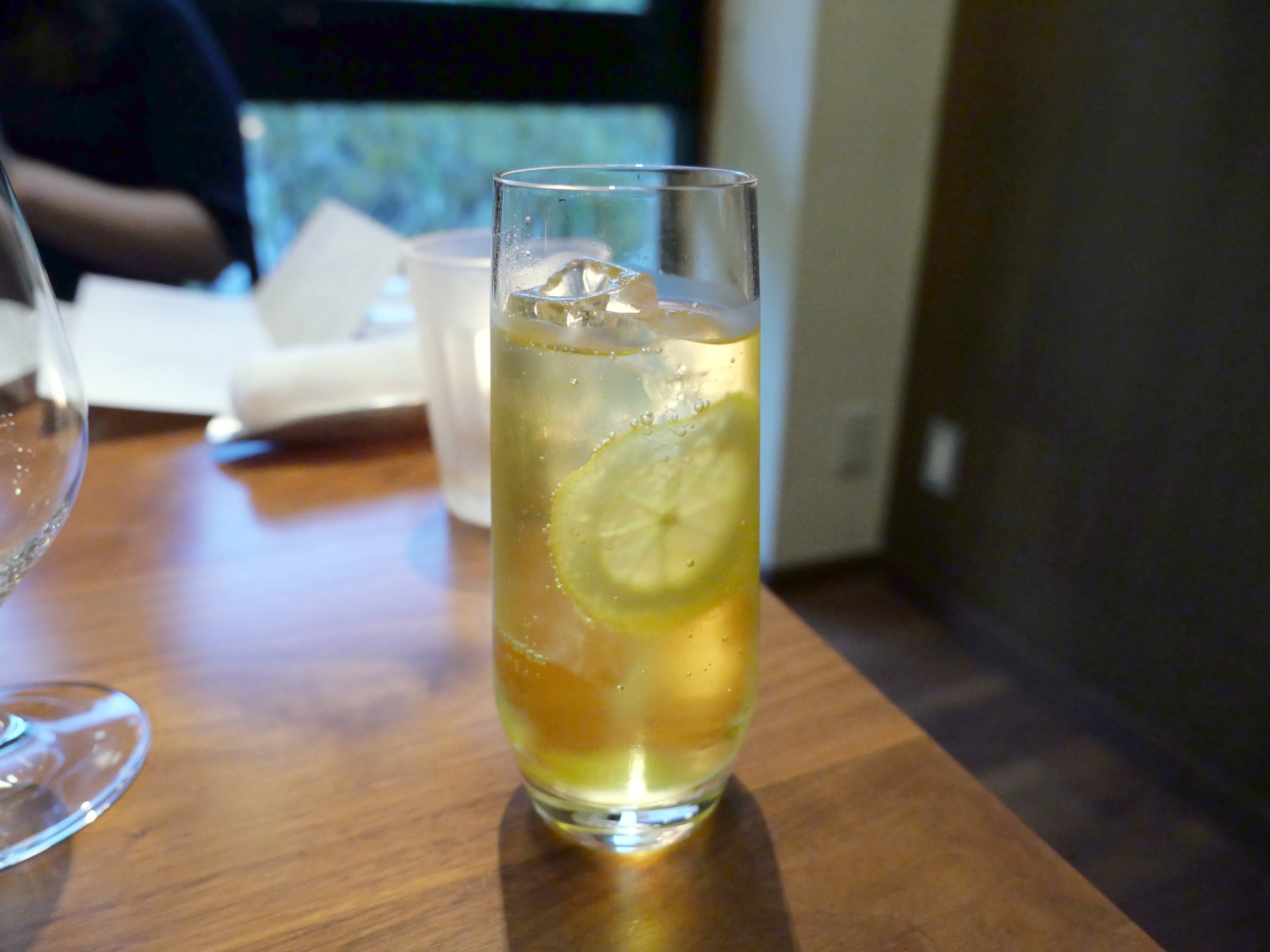A citrus tea to open the evening.