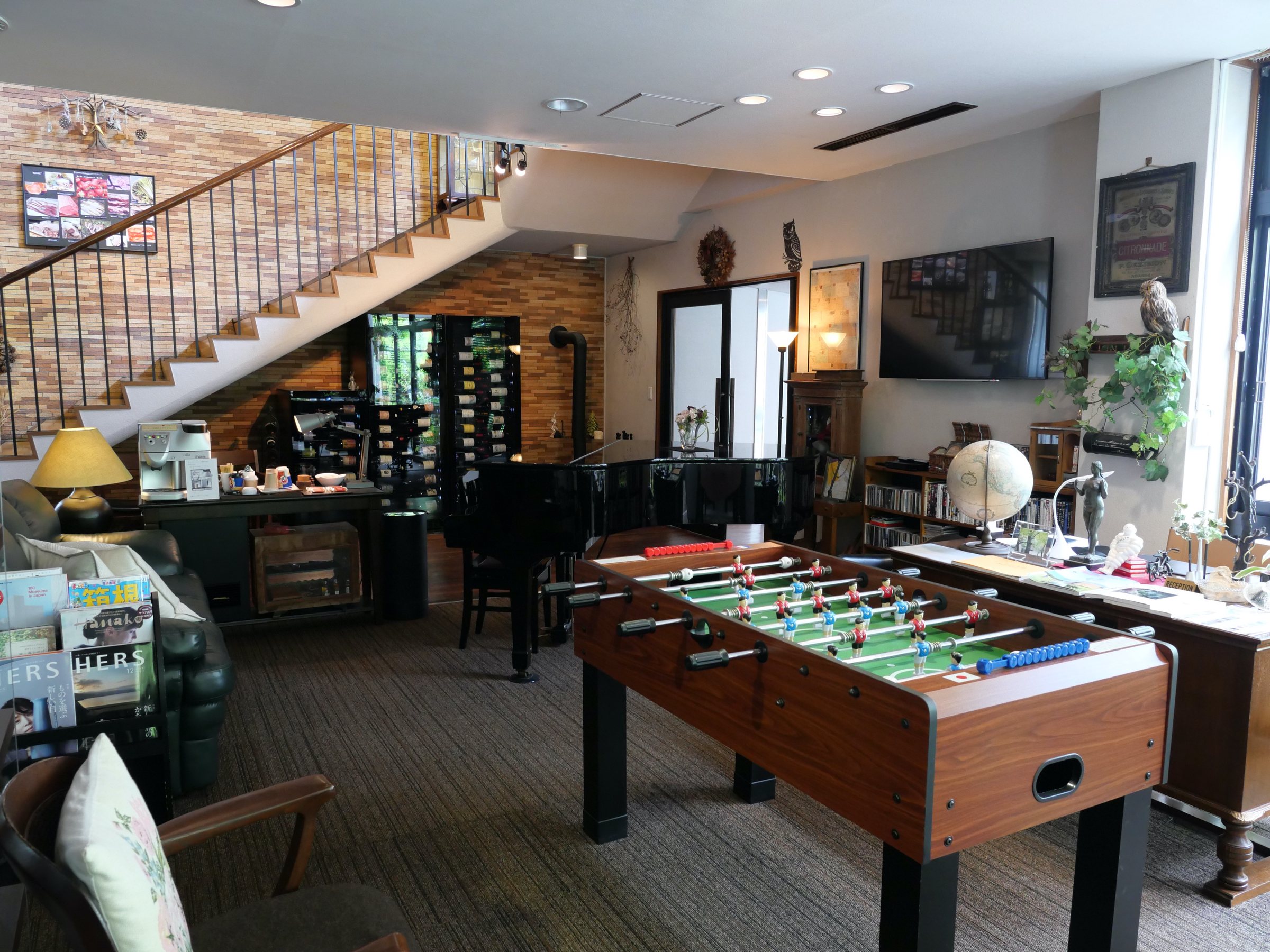 The lobby: books, magazines and a foosball table.