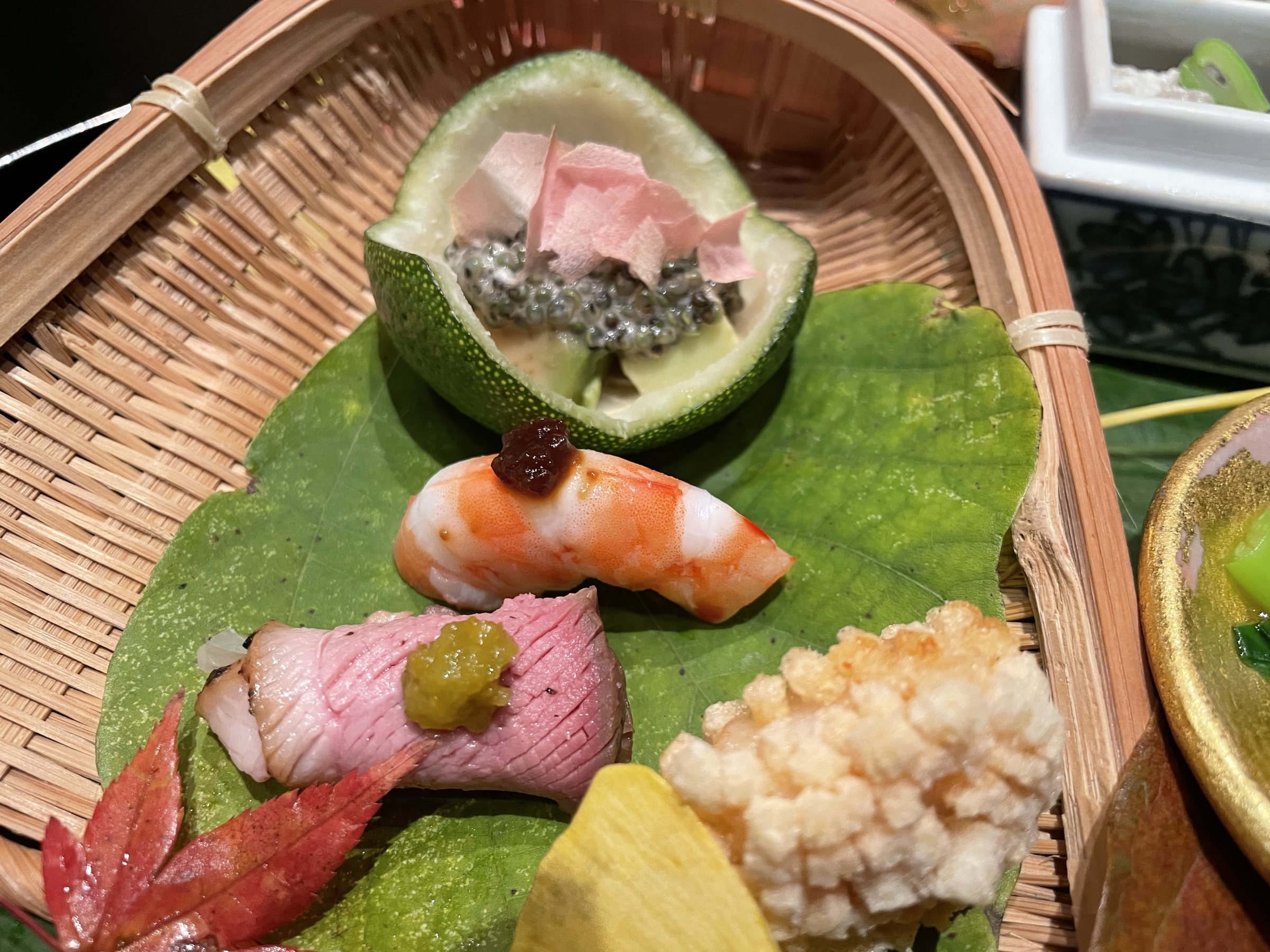 Duck with yuzu kosho, prawn, battered scallop and tonburi in a citrus cup.