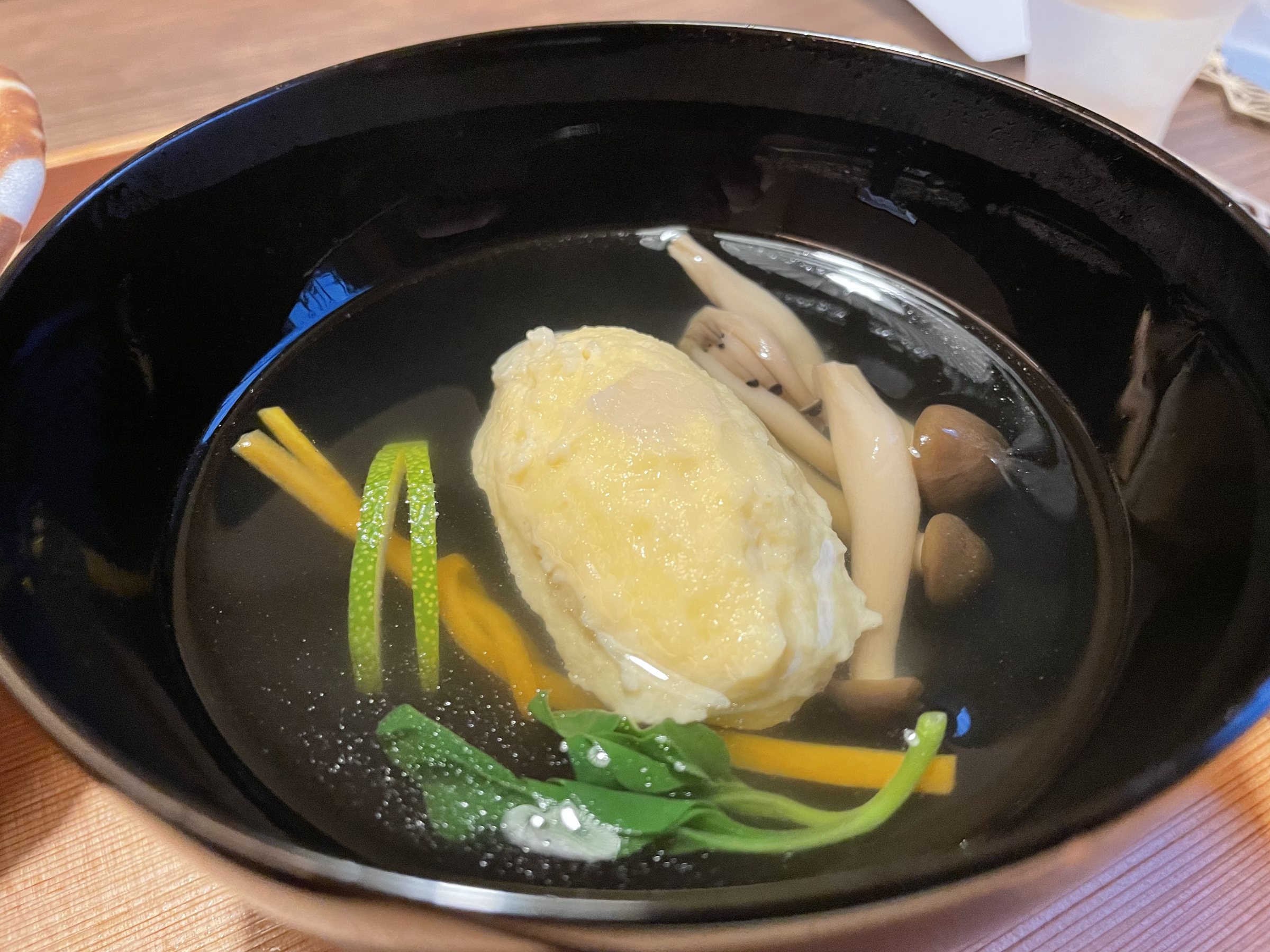 The clear soup: a shinjo dumpling with shimeji mushrooms in clear broth.