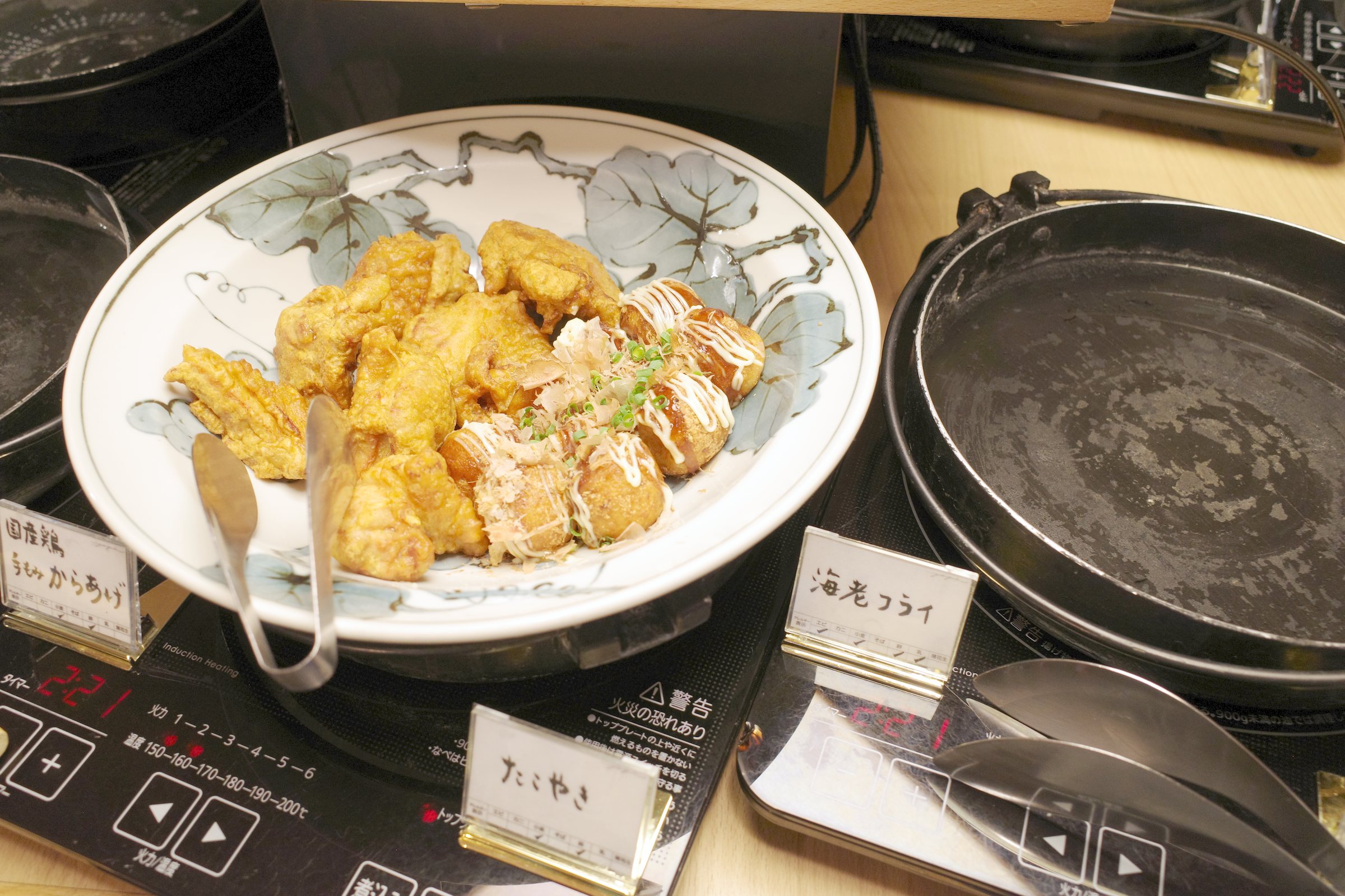 A platter of fried dishes, kept warm.