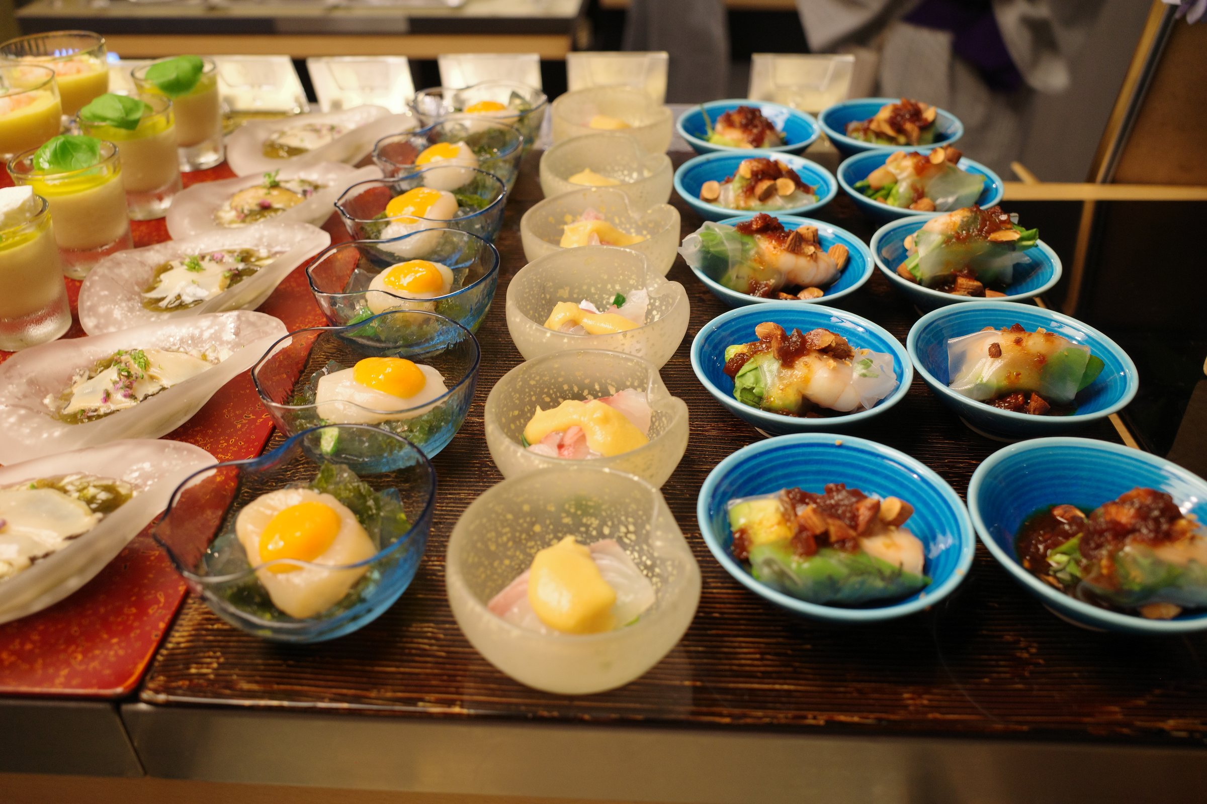 More small dishes, rows of them, each with its own label.