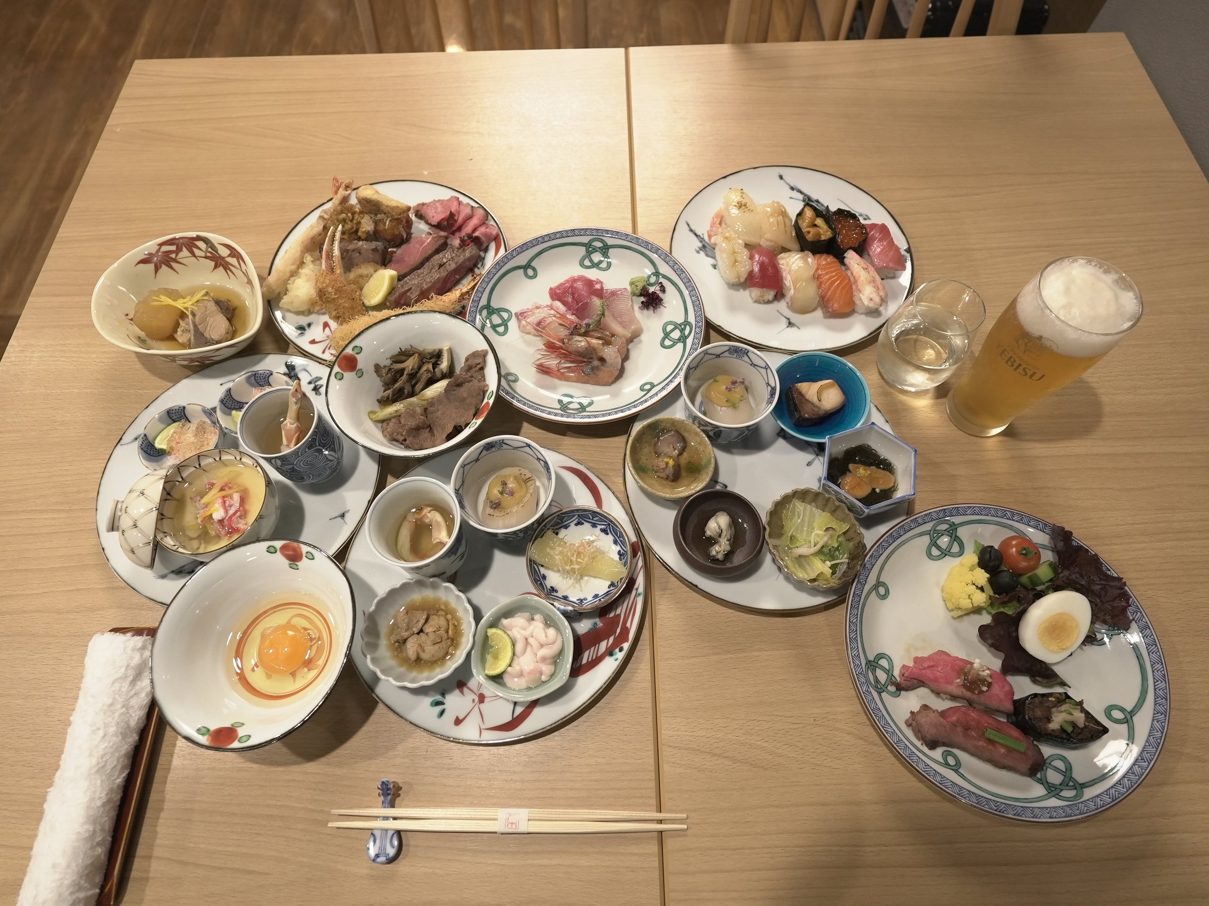 A table spread with plates from the buffet, seen from above.