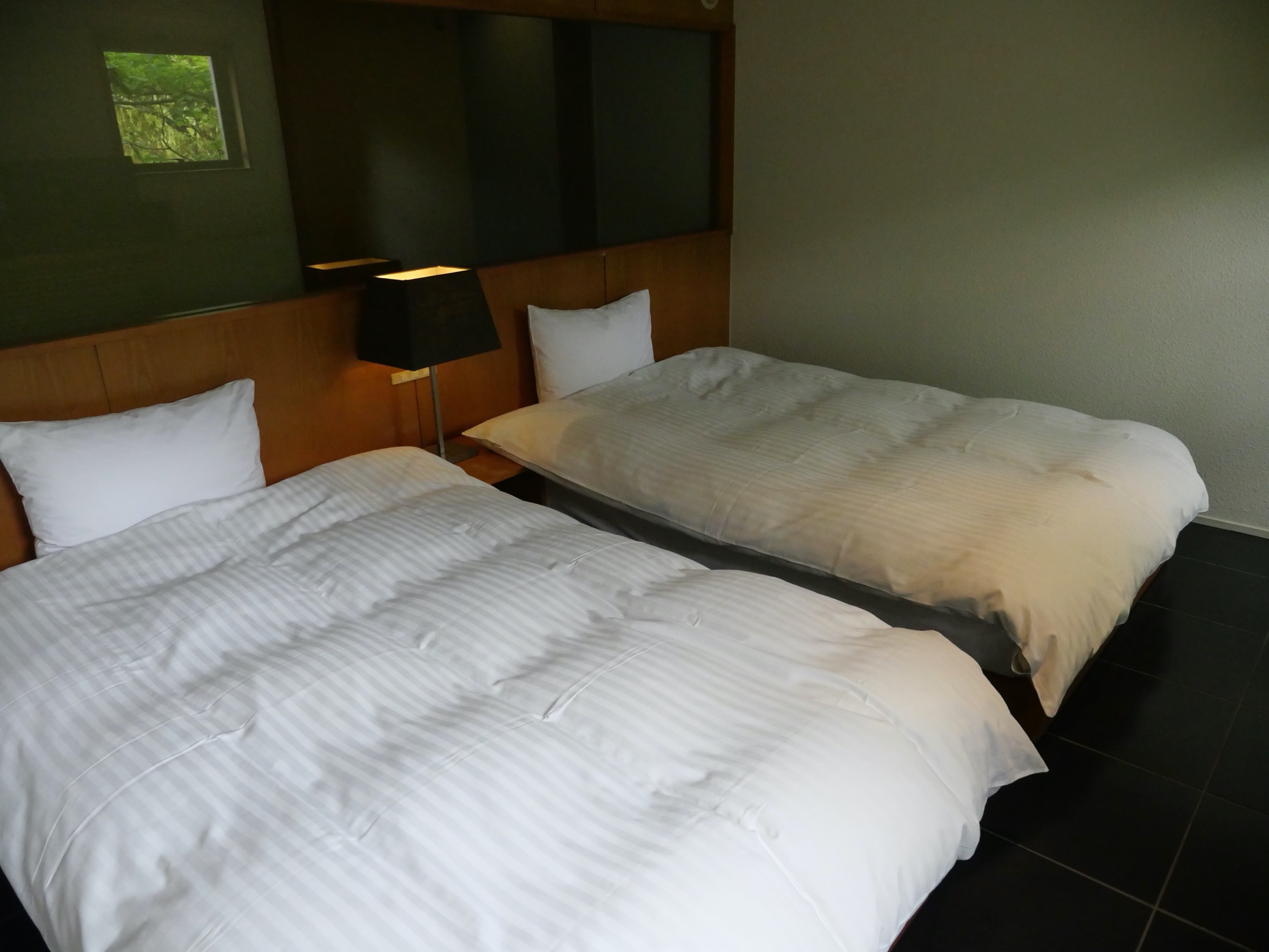 The bedroom, in the softest shades of white.