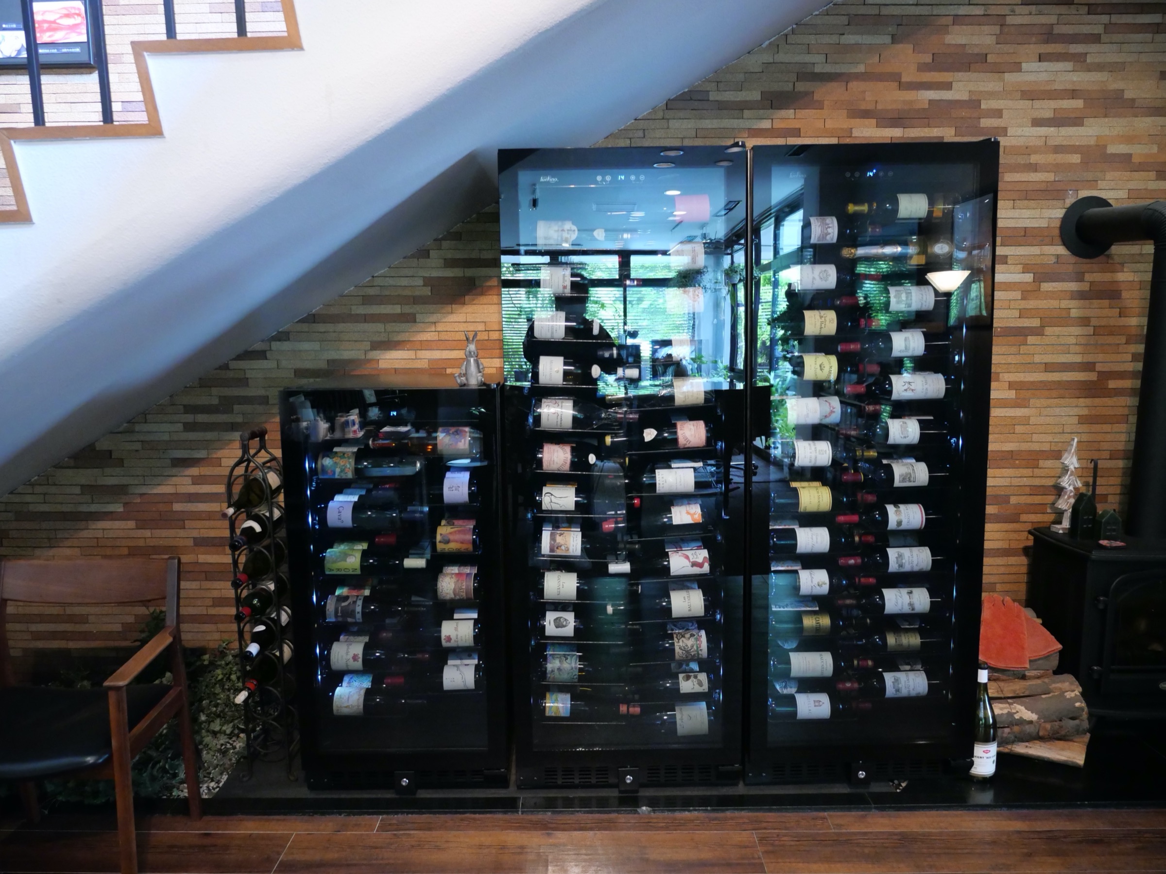 The wine cellar, set beneath the staircase like a private collection.