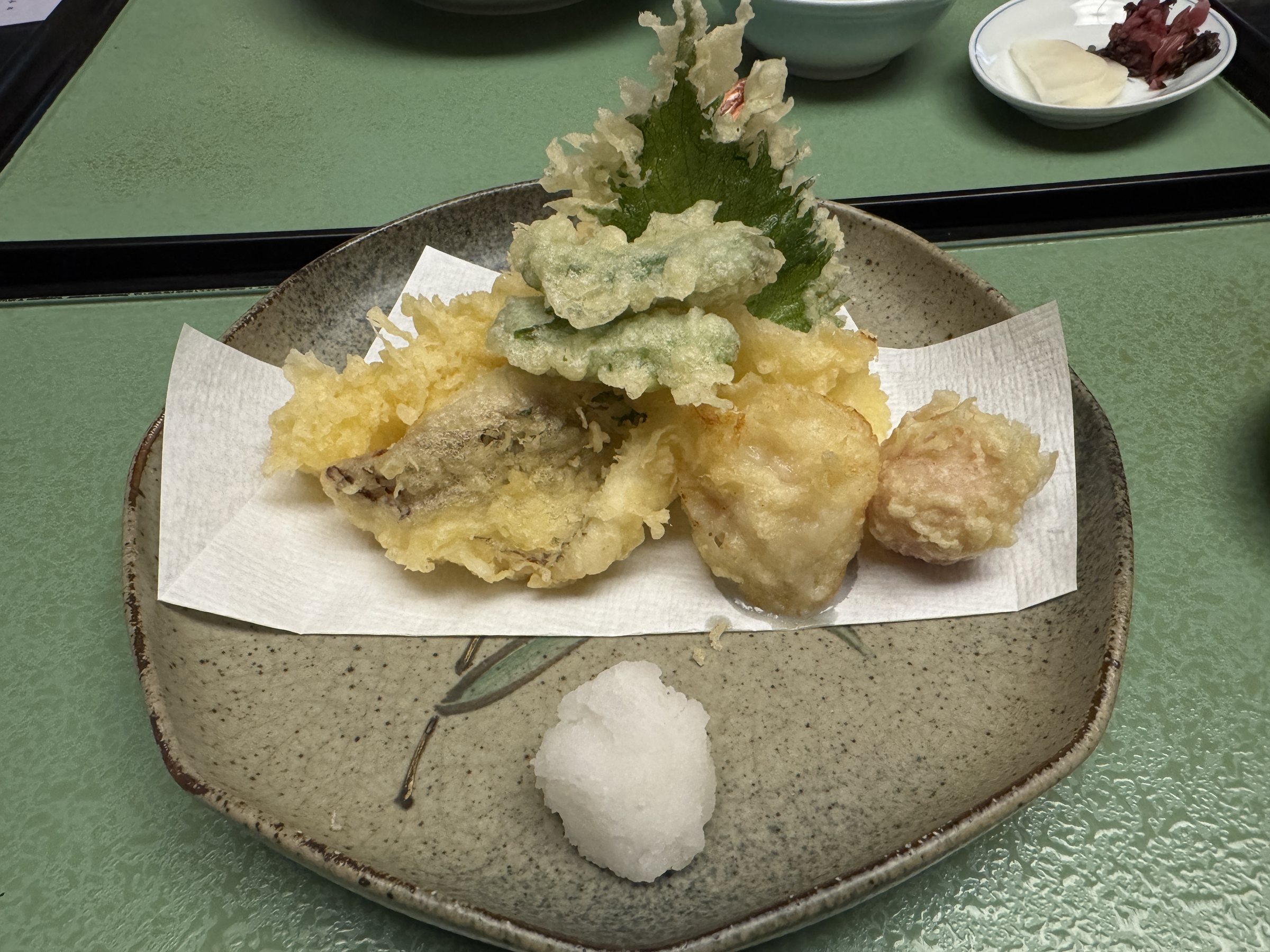 Tempura of prawn, fish and shiso leaf, with grated daikon.