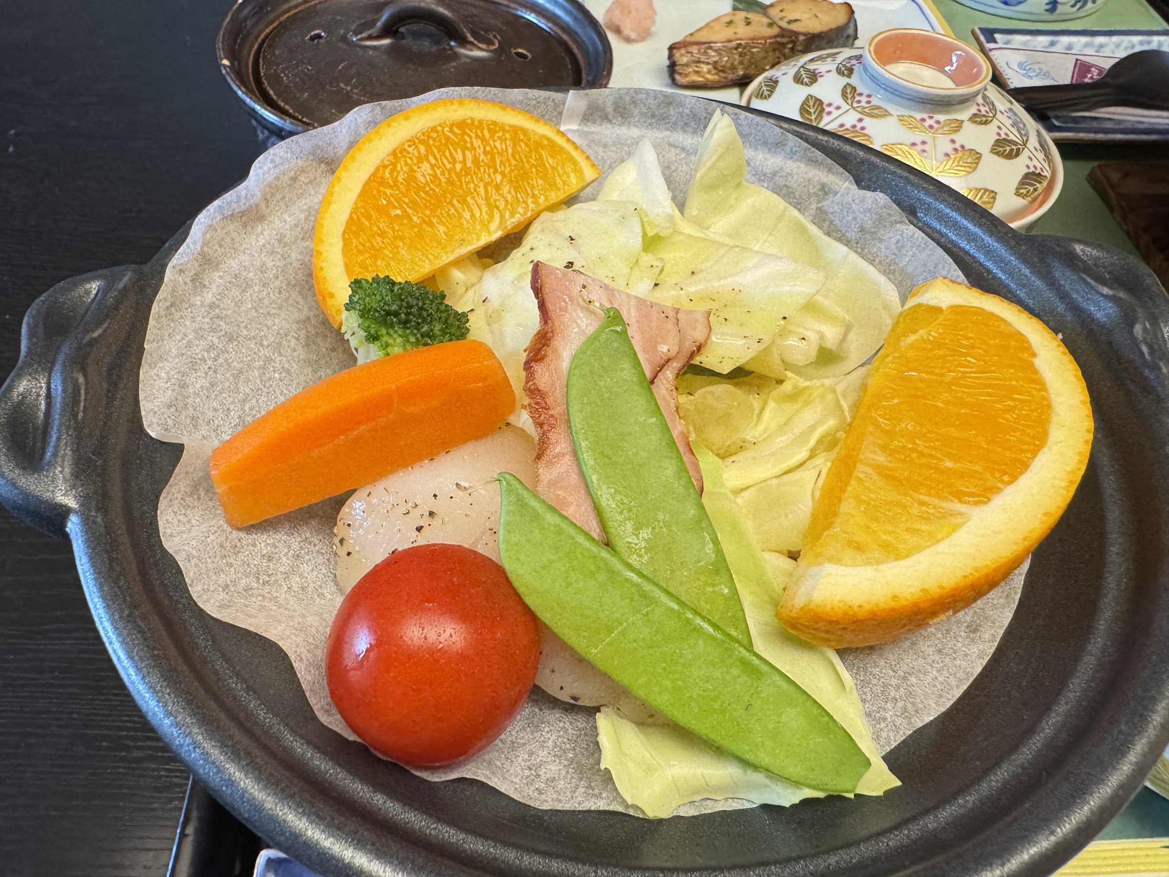 Warm vegetables, fresh from their small pot.