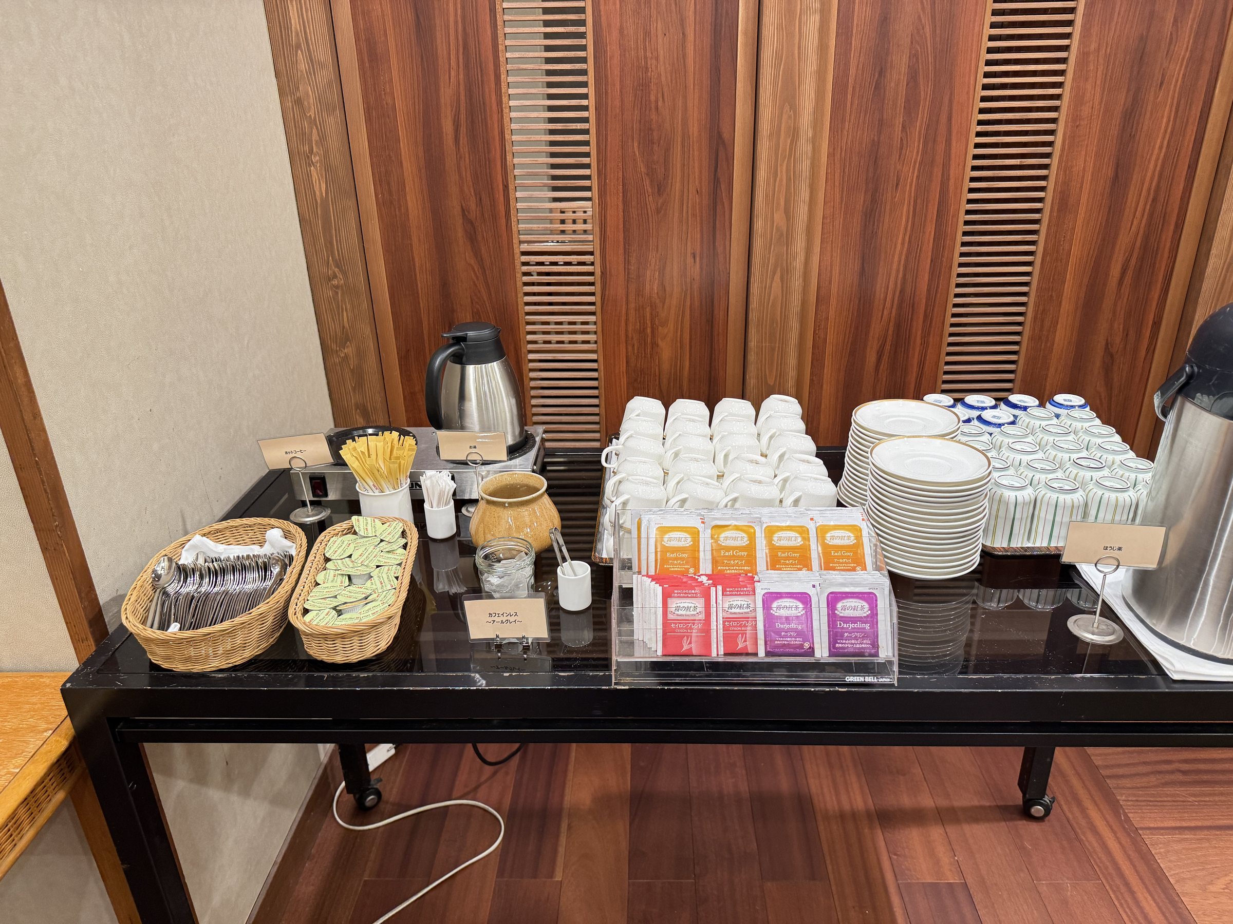 The hot drinks station, with teas and cups.