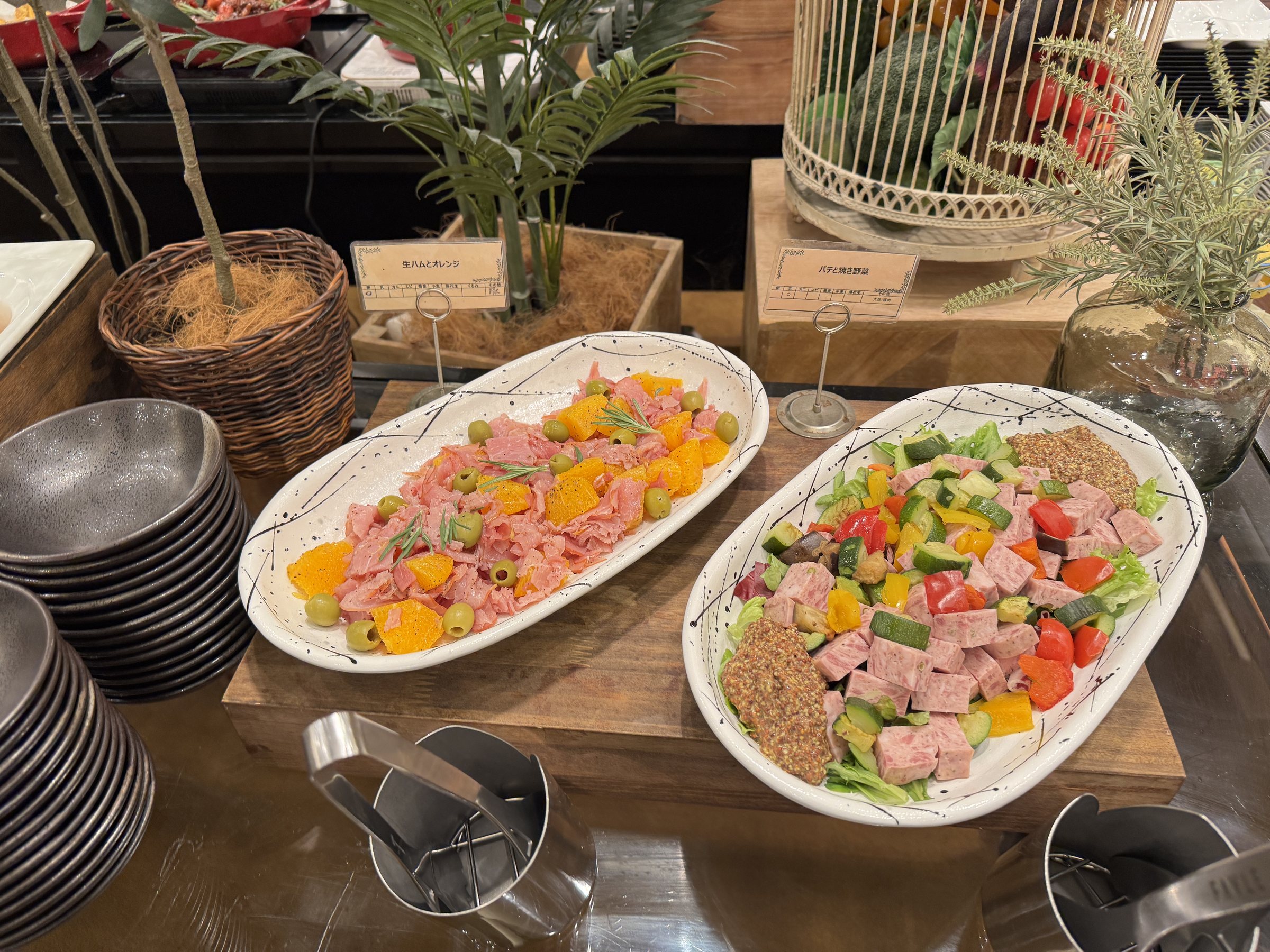 Platters of carpaccio and salad.