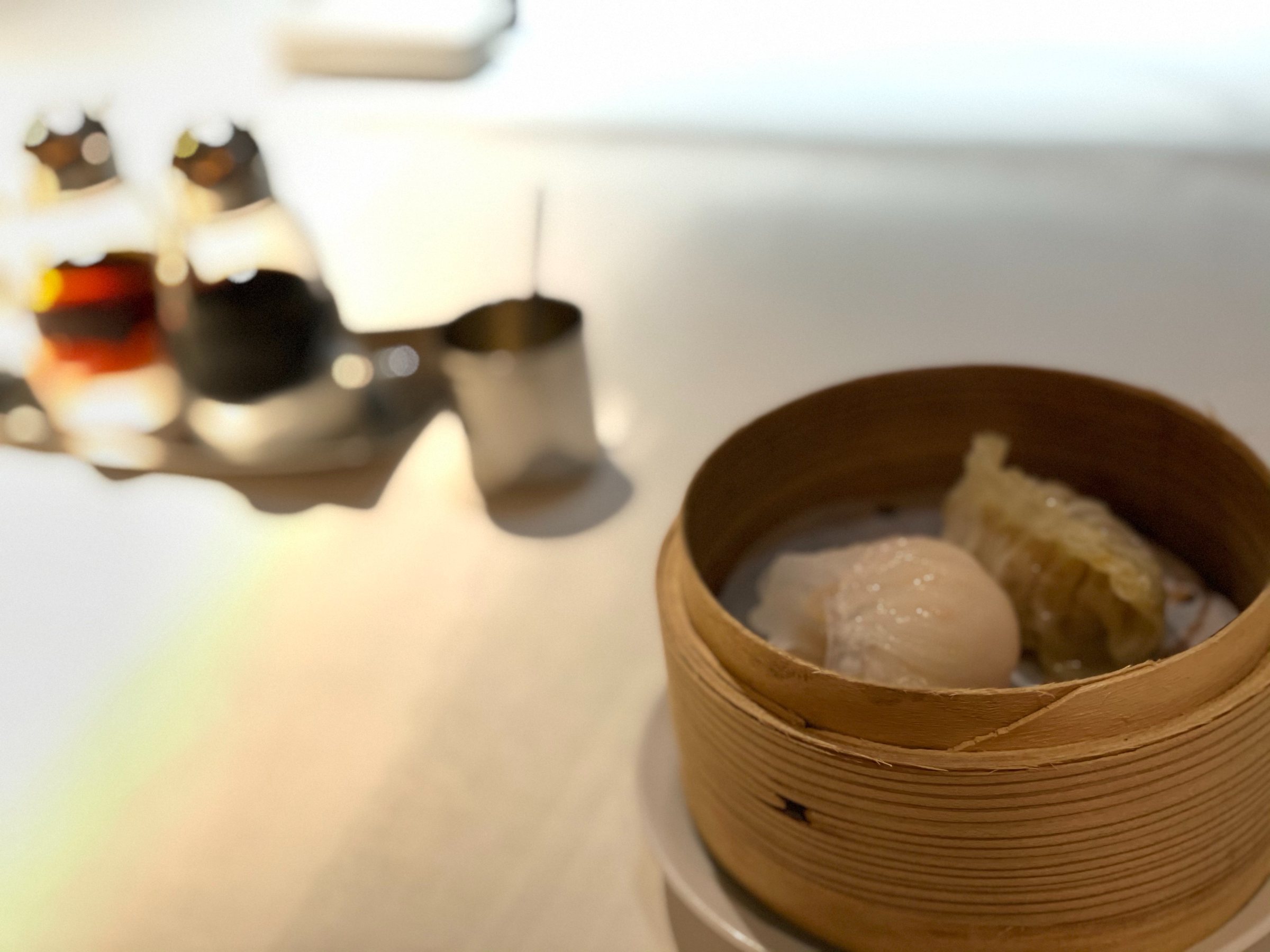 Dim sum in a bamboo steamer.