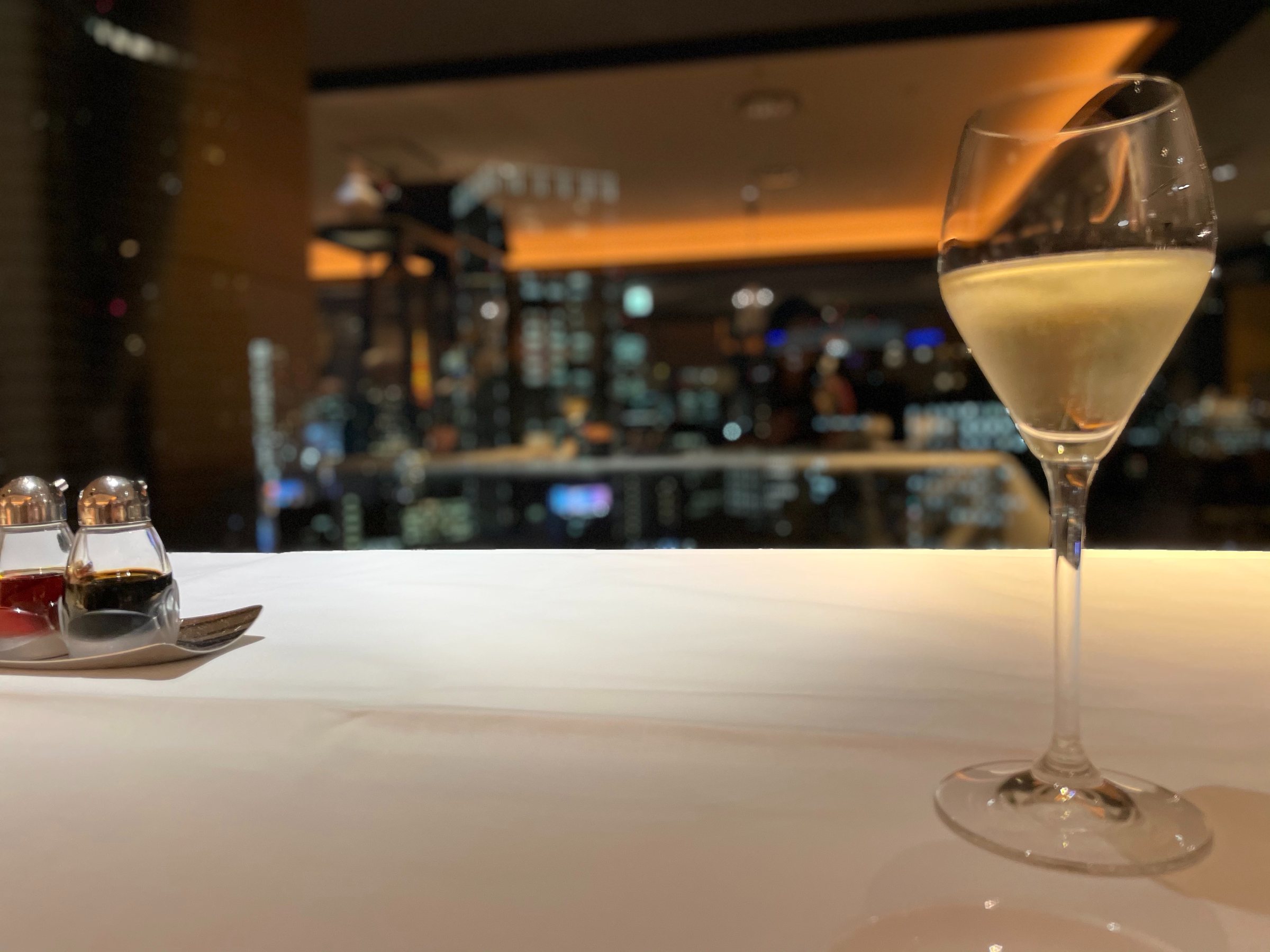 Champagne for the toast, and the night view beyond.