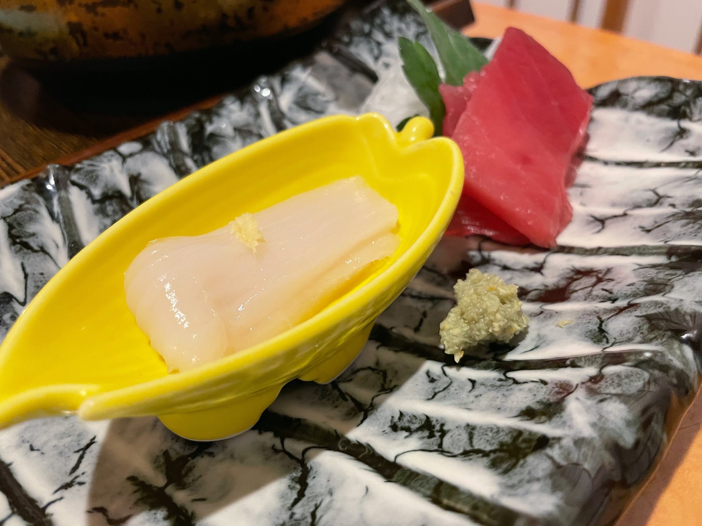 Squid and tuna sashimi, with grated wasabi.