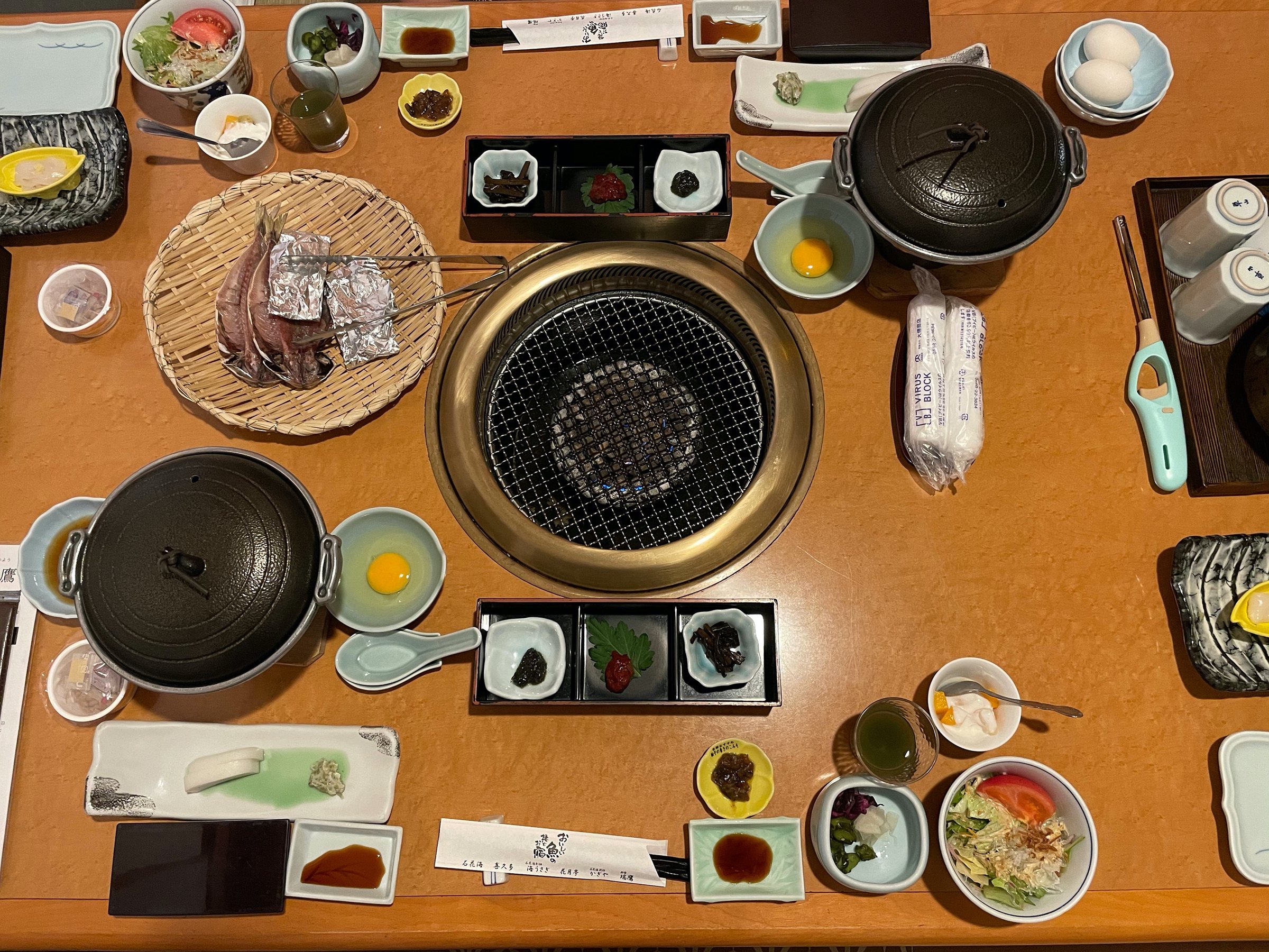The breakfast table, with its own grill at the center.