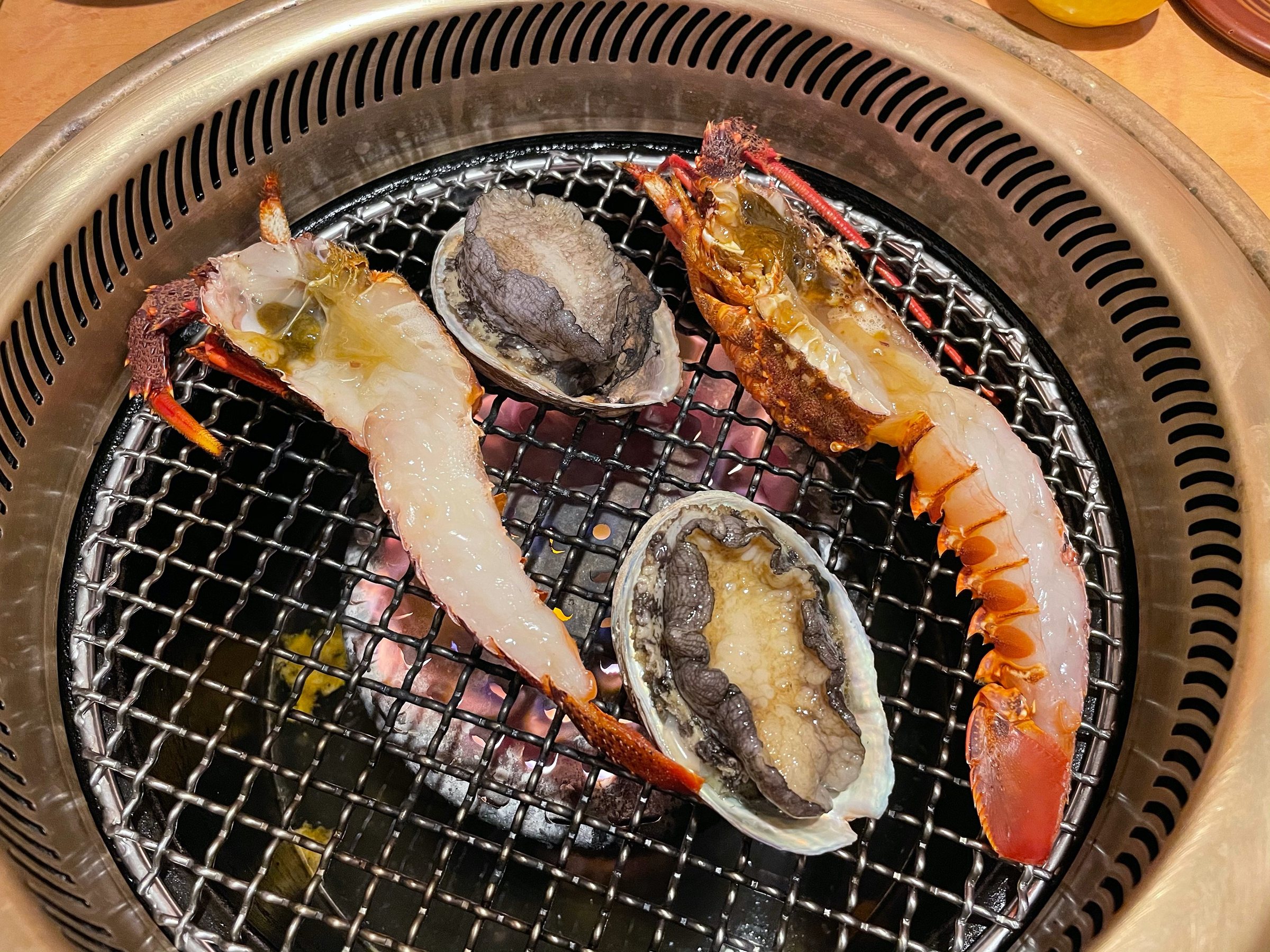 Spiny lobster and abalone on the grill.