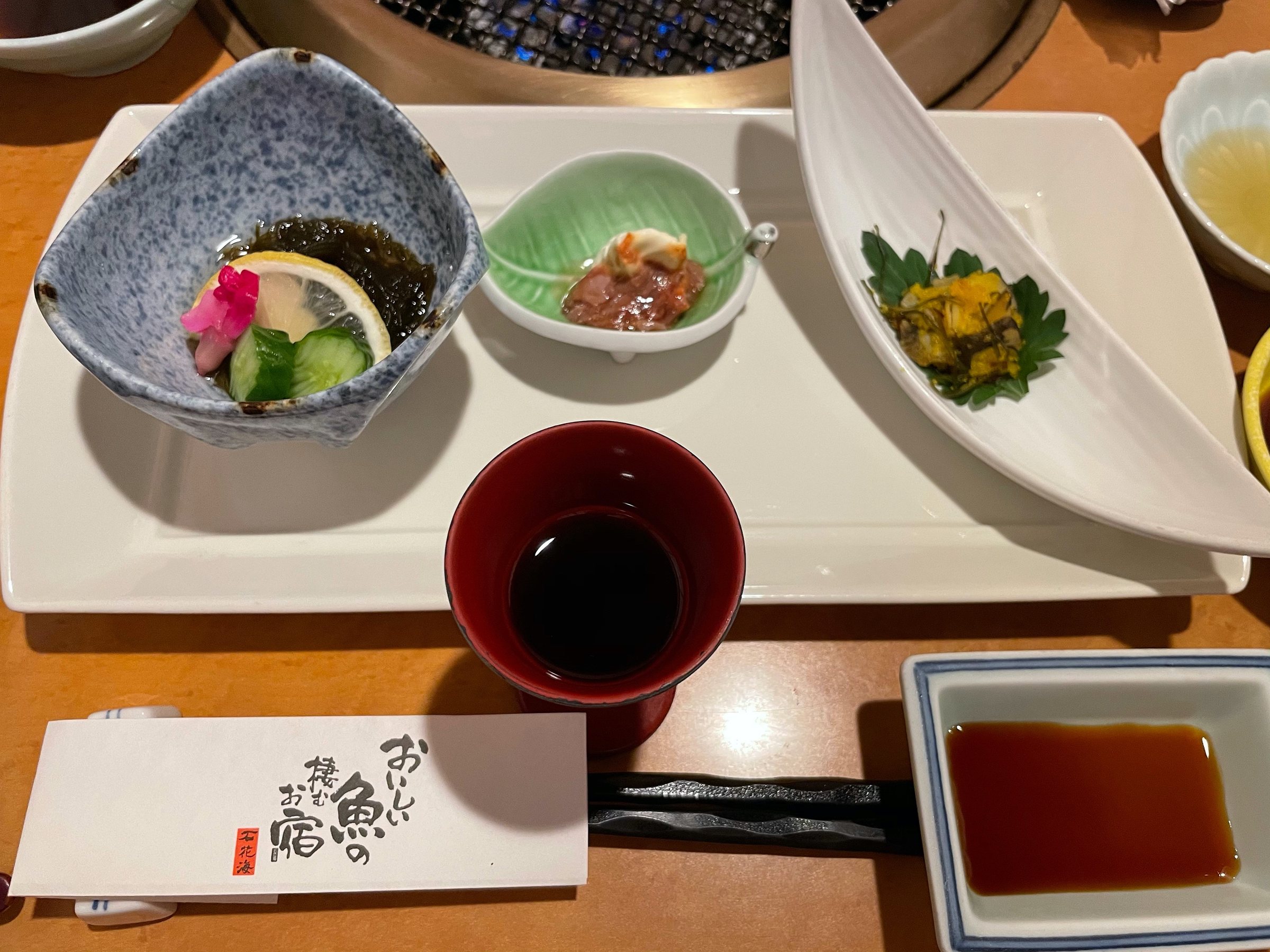 Small dishes to begin, with soy sauce for the sashimi to come.