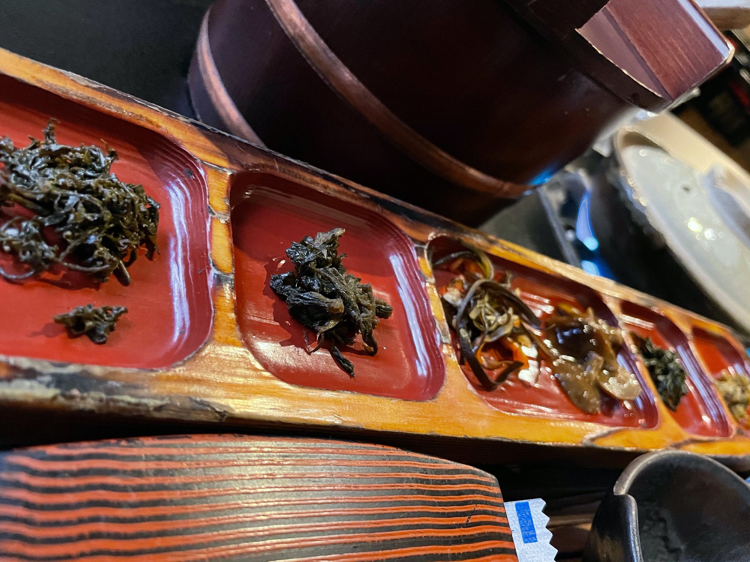 A long lacquered dish of the ryokan's own tsukudani.