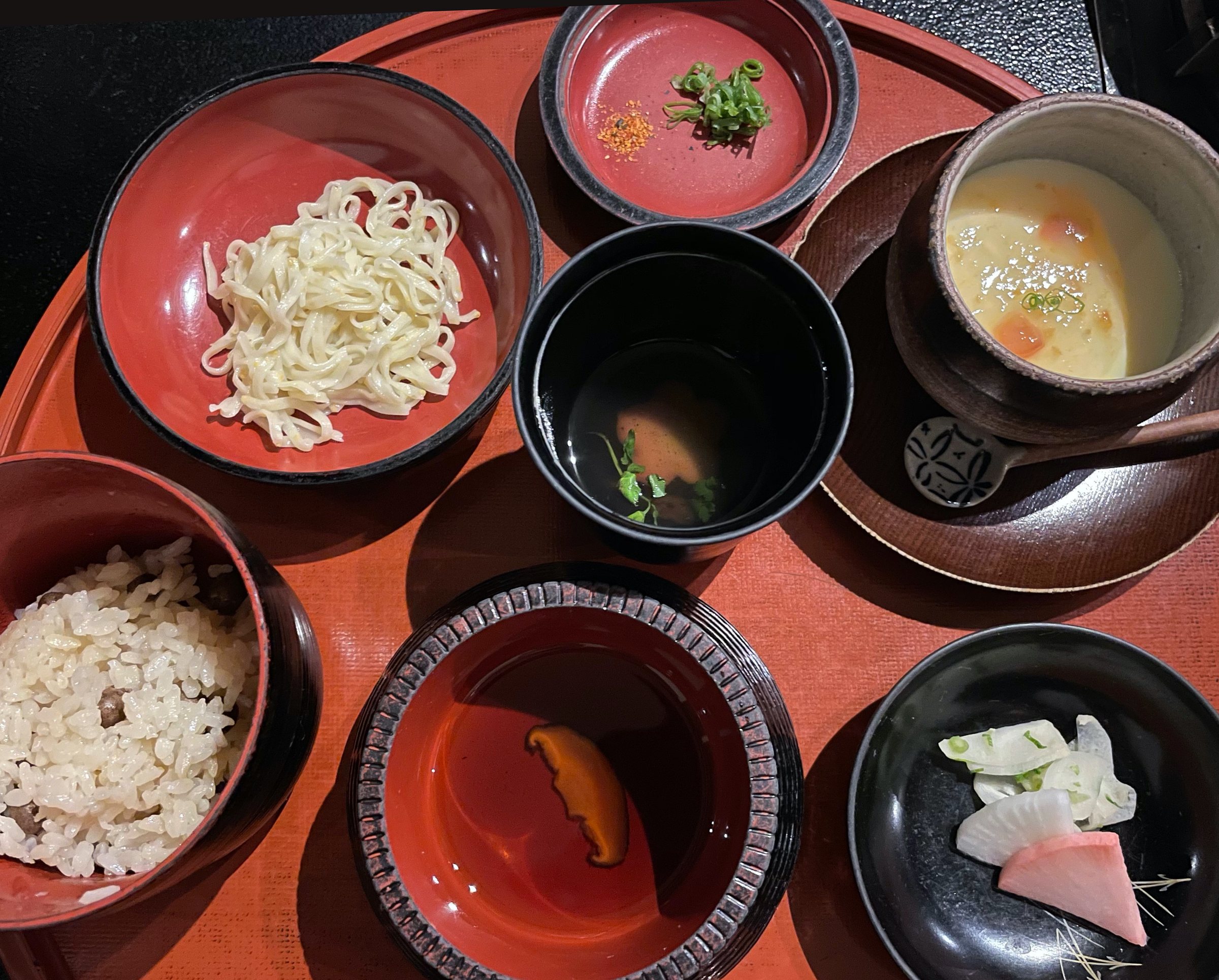 Mukago rice, handmade udon and cheese chawanmushi on a lacquered tray.