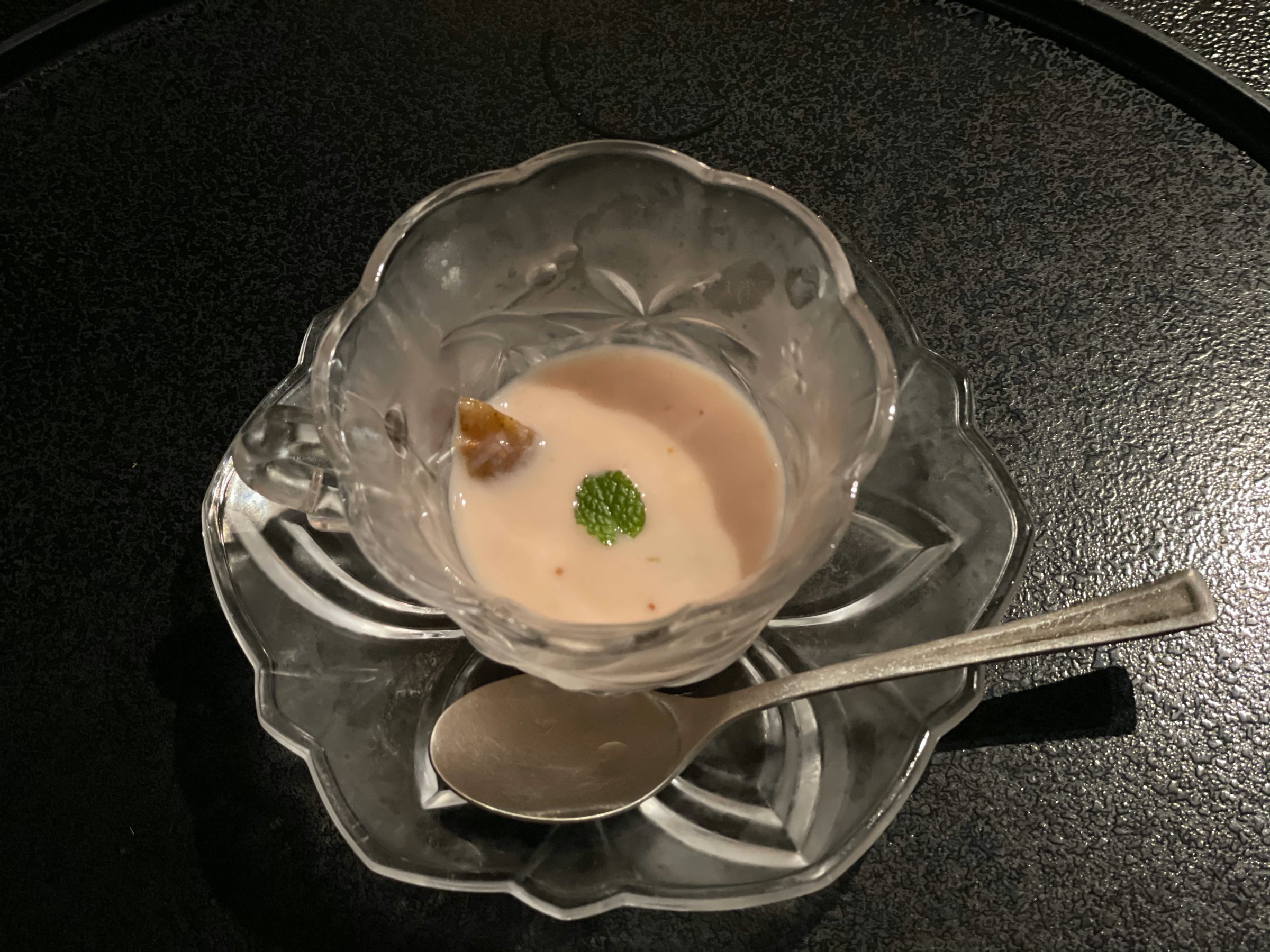 Chilled fig soup in a glass bowl.