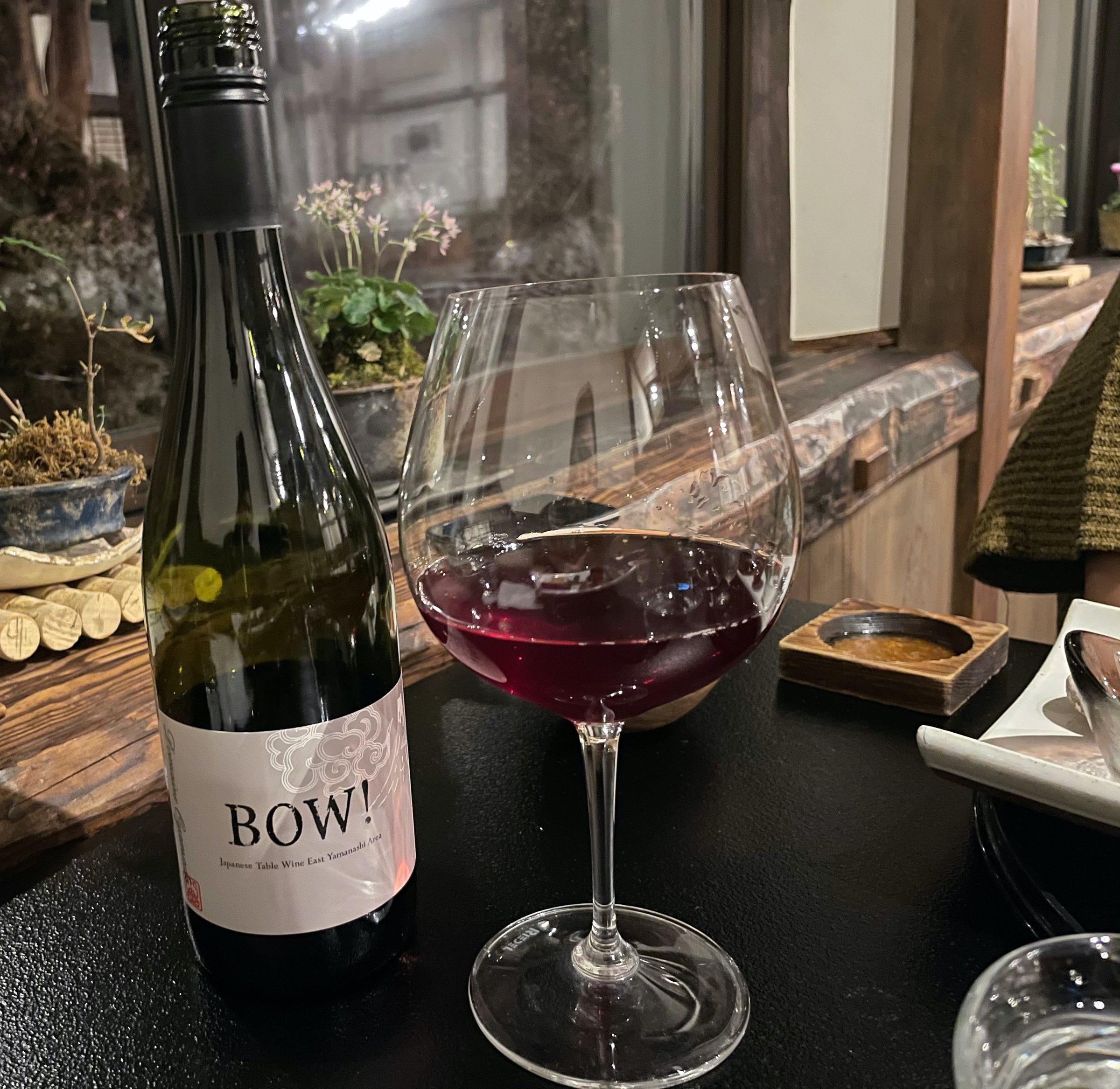 A Yamanashi red, poured at the table.