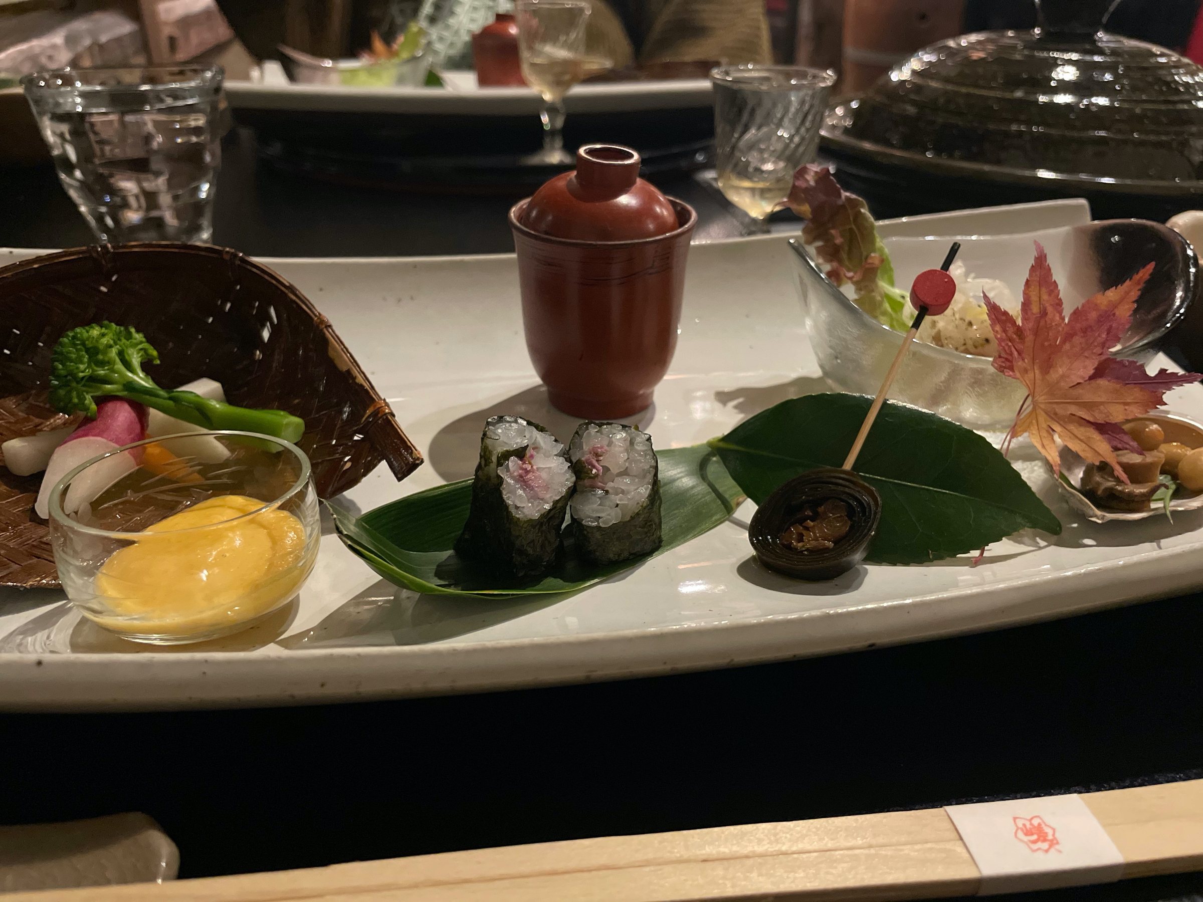 The appetiser platter, garnished with autumn leaves.