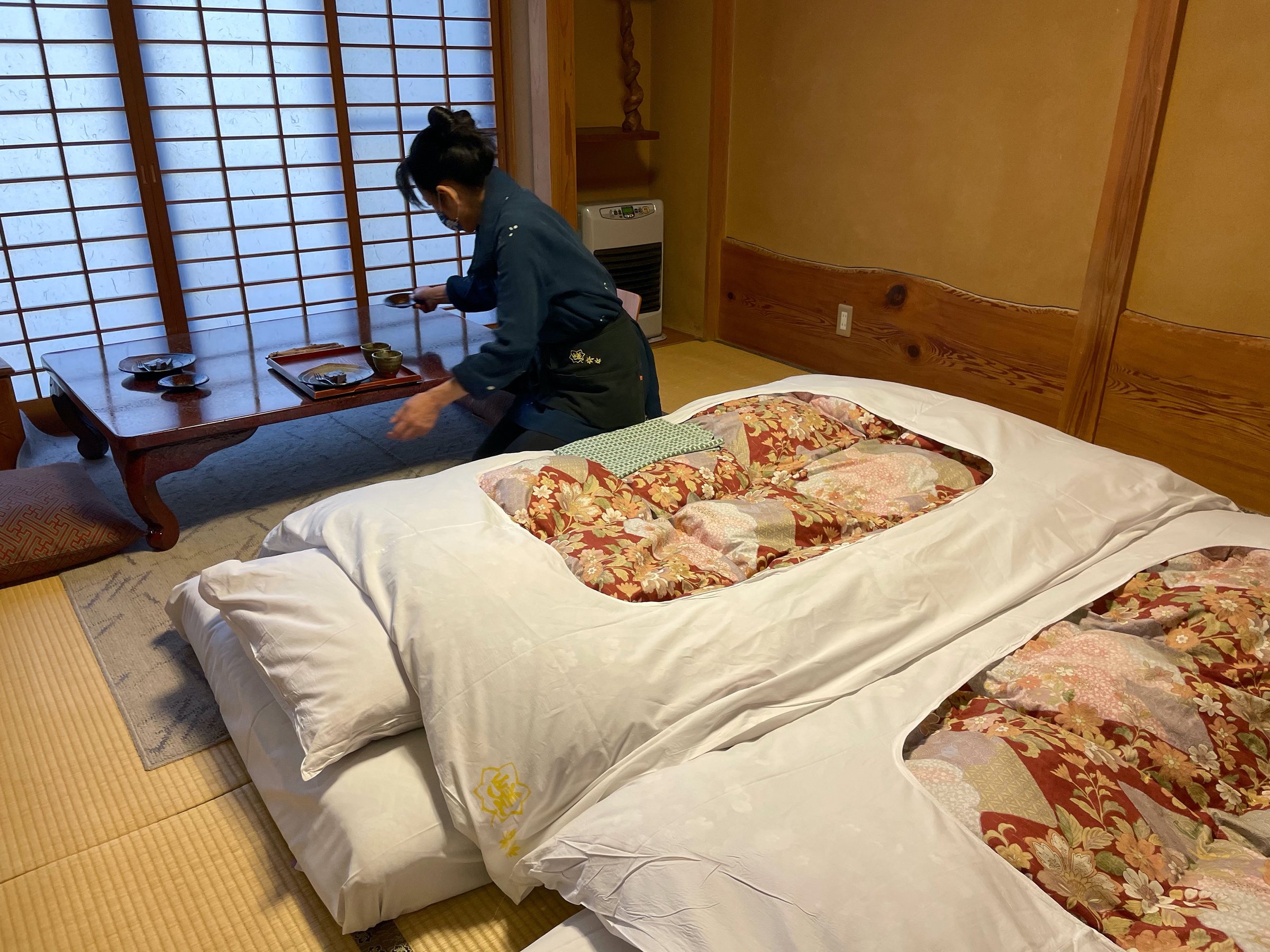 Futon laid out in the tatami room.