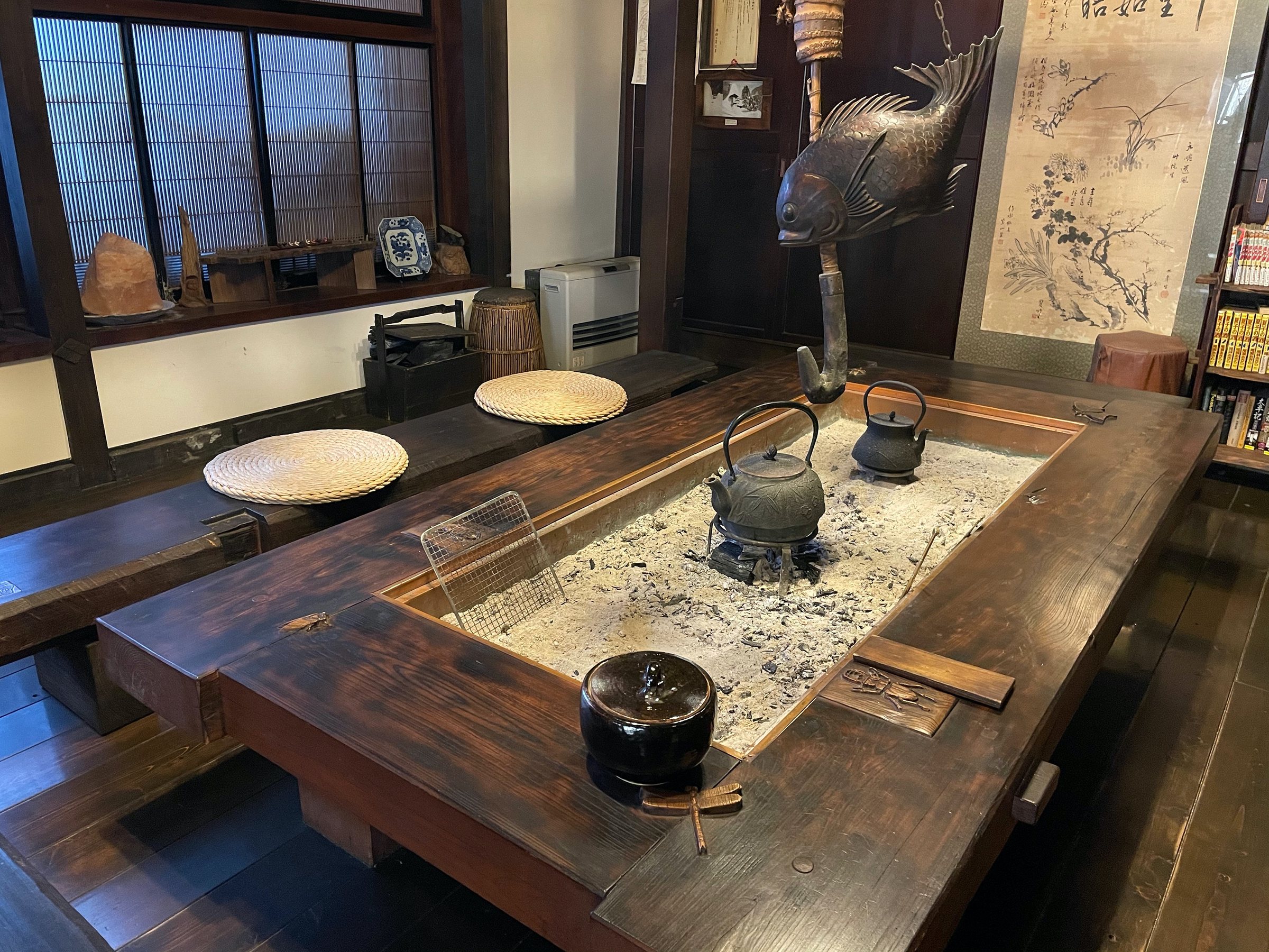 The irori room, its hearth ready for toasting.