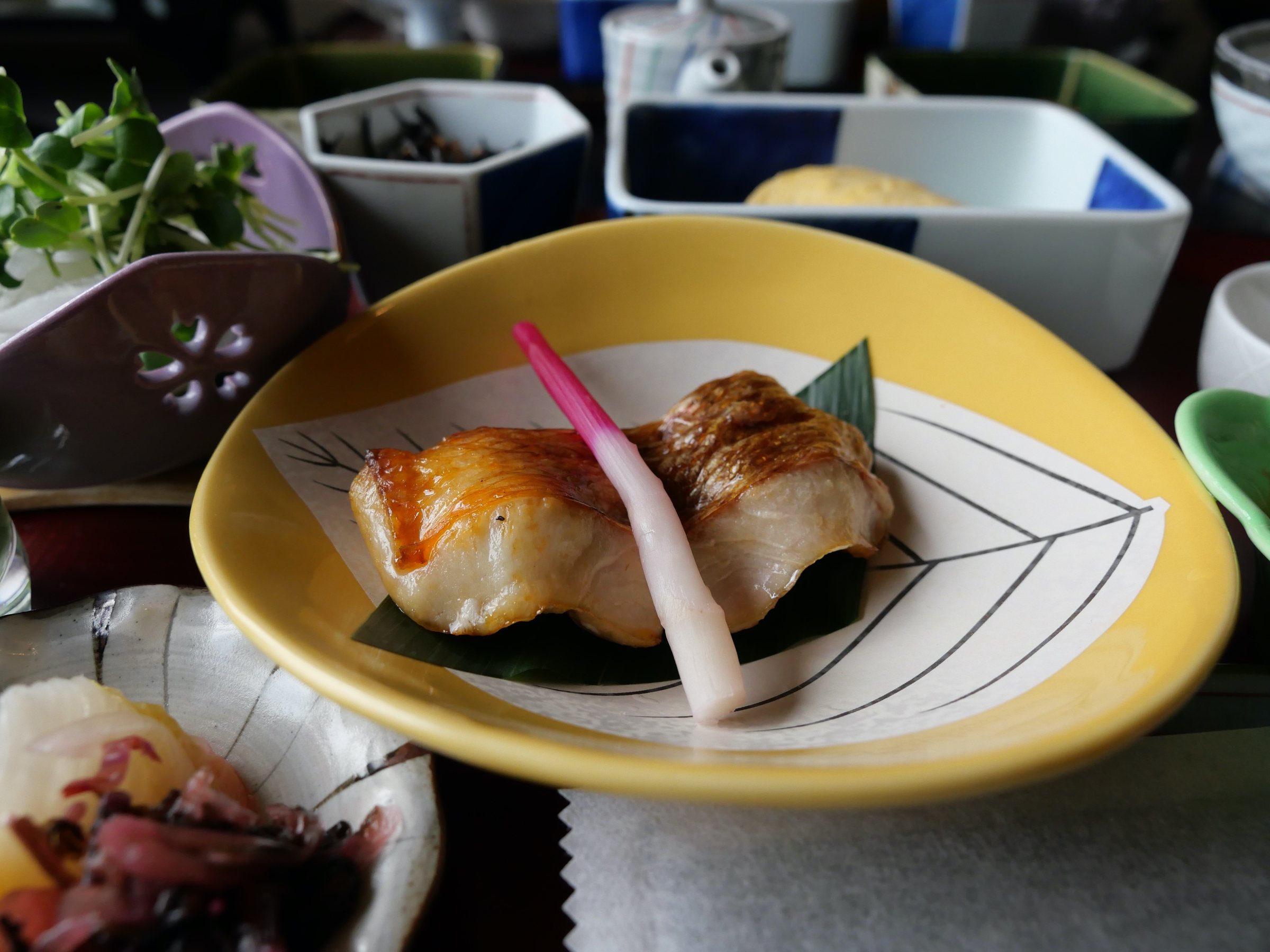 Dried kinmedai, grilled, with a pickled ginger shoot.