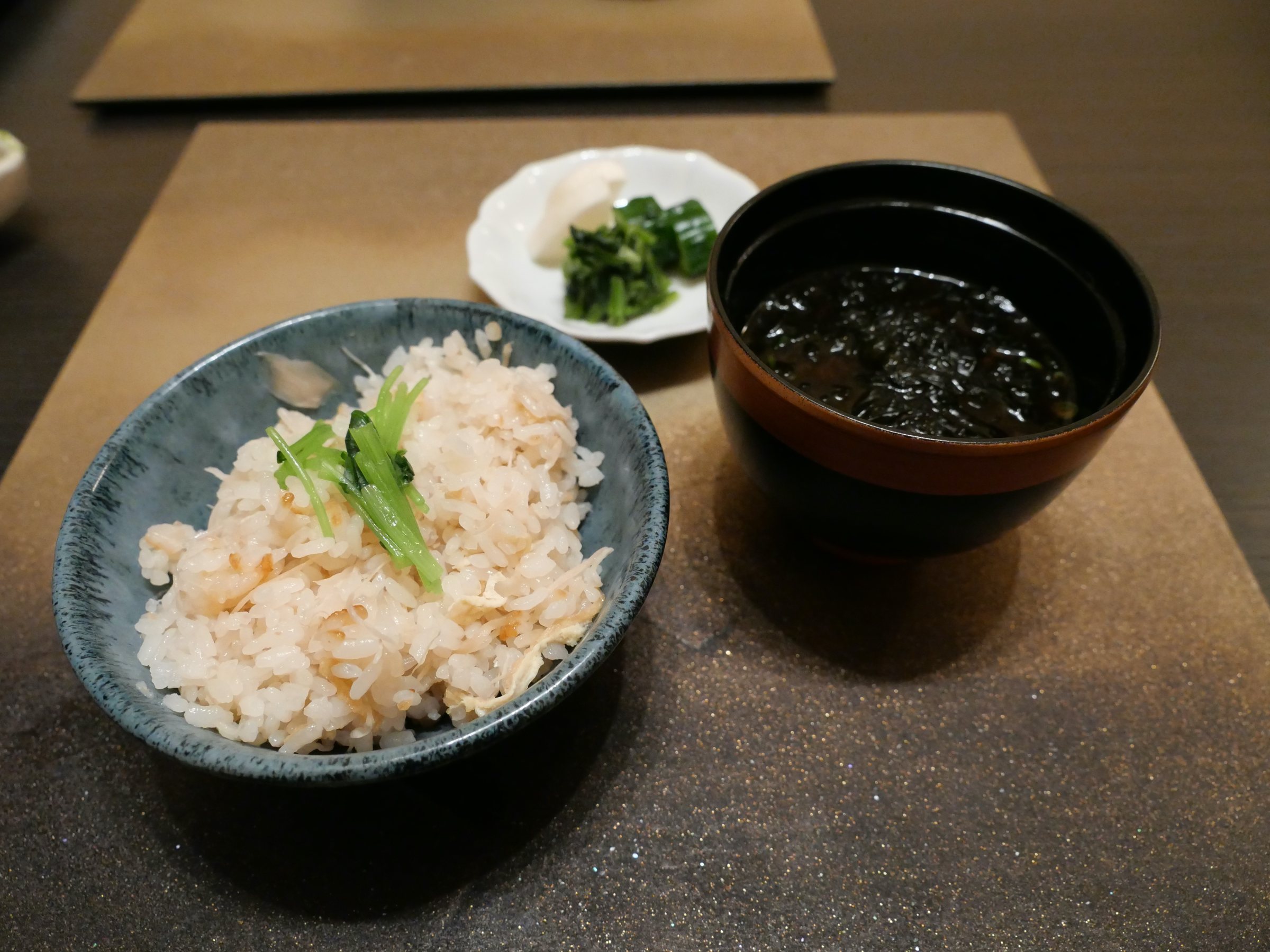 Crab rice, with soup and pickles.