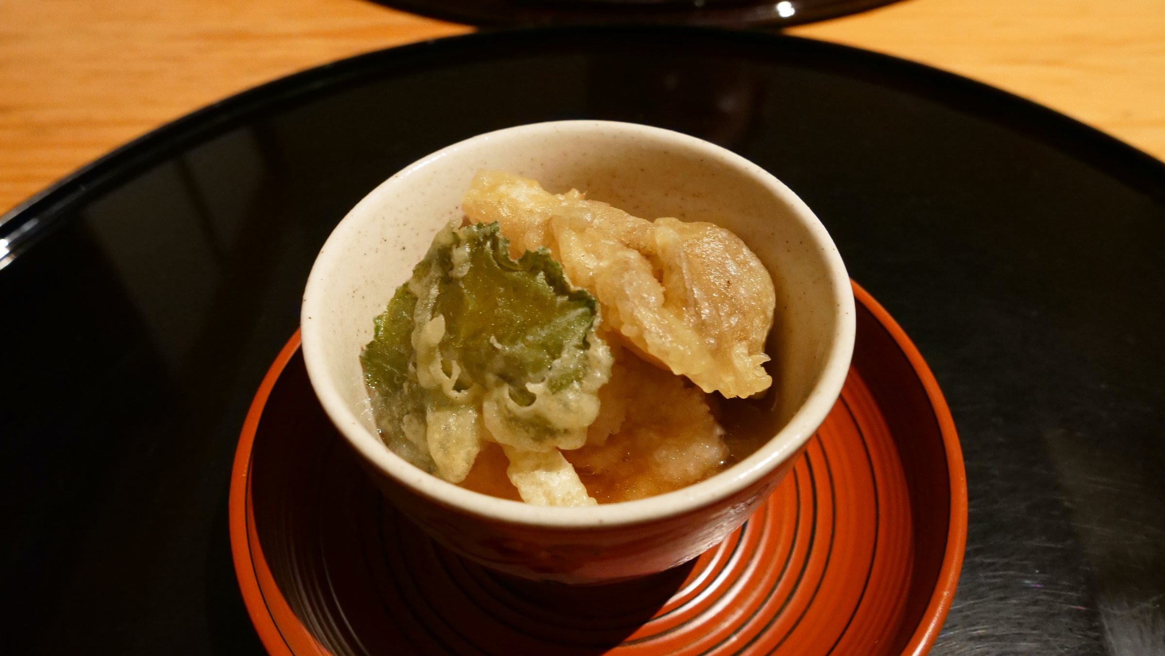 Agedashi sesame tofu in a deep bowl.