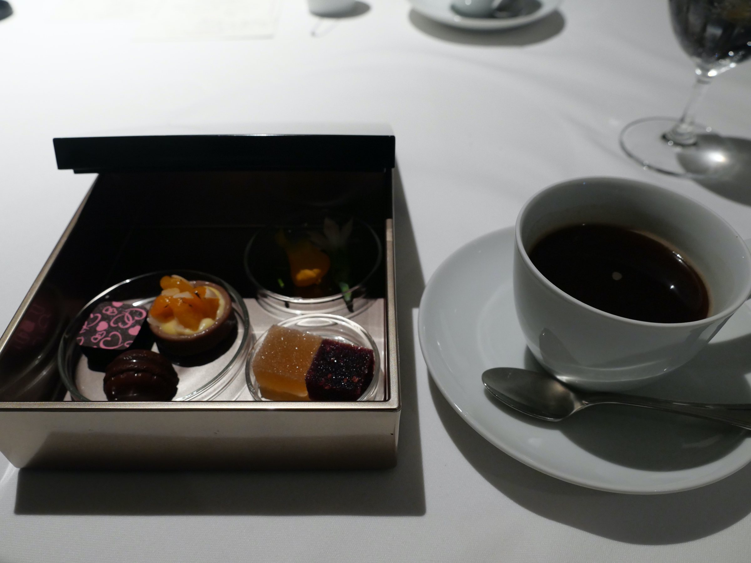 The petits-fours box, with coffee.