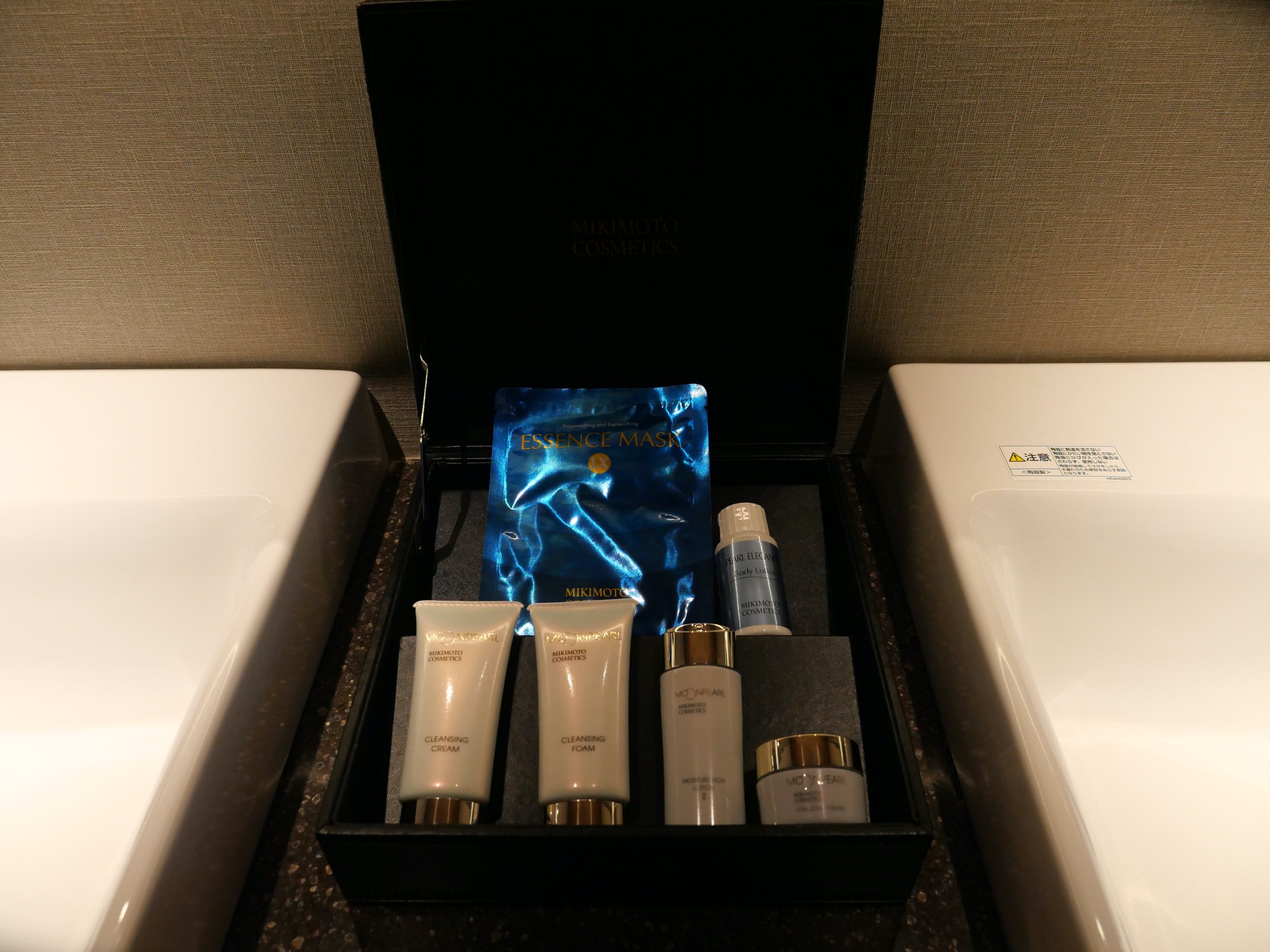 MIKIMOTO COSMETICS amenities, presented in a black box.