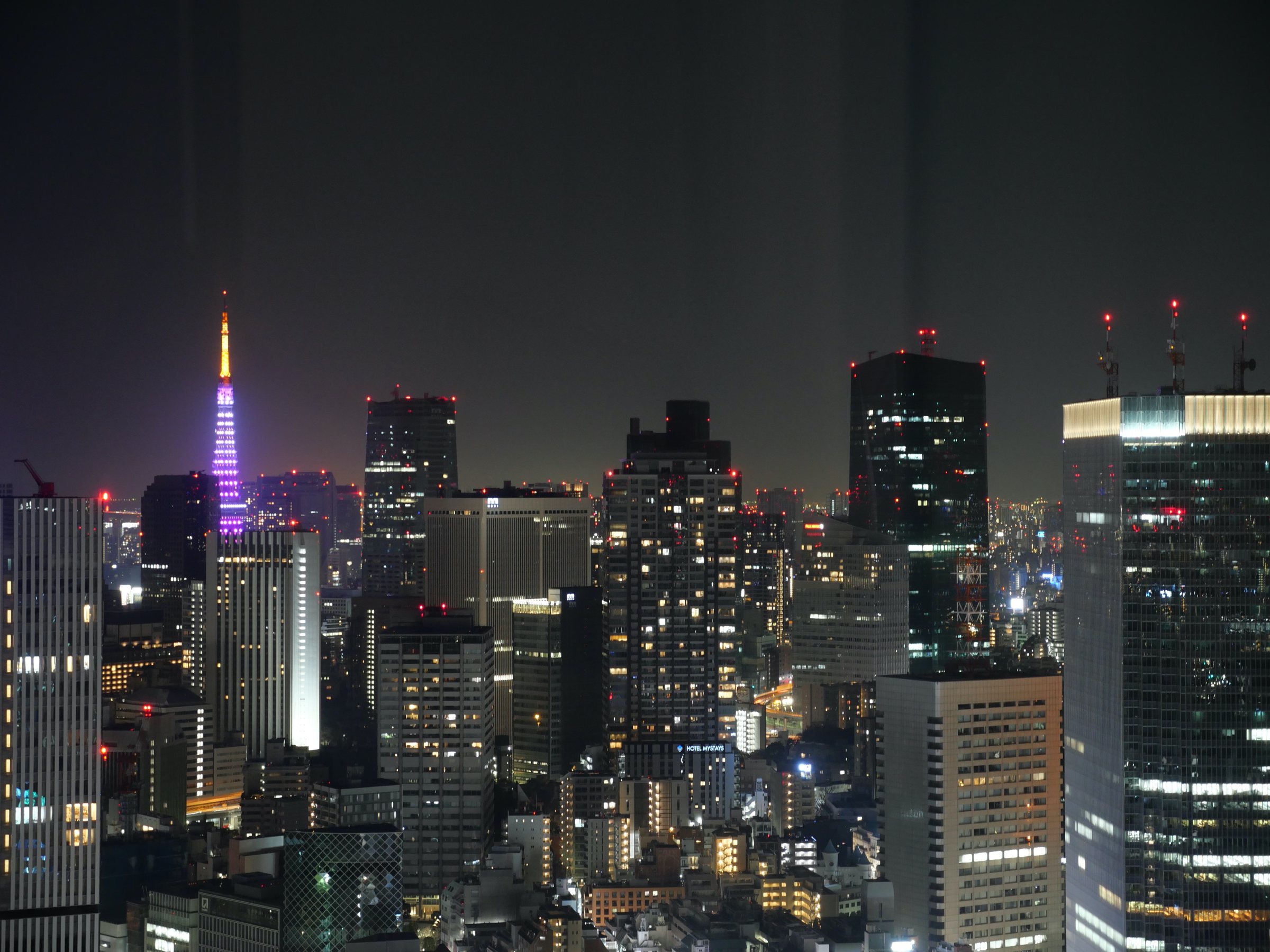 Tokyo Tower, lit in purple.