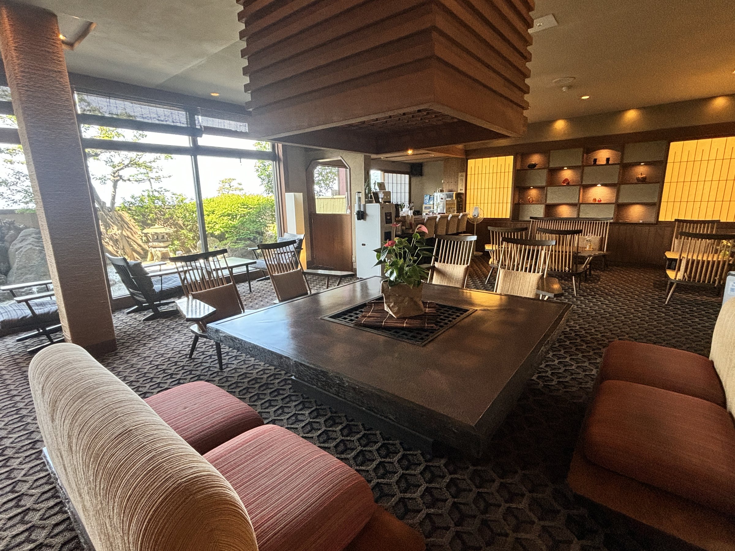 Low sofas gathered around the hearth in the lounge.