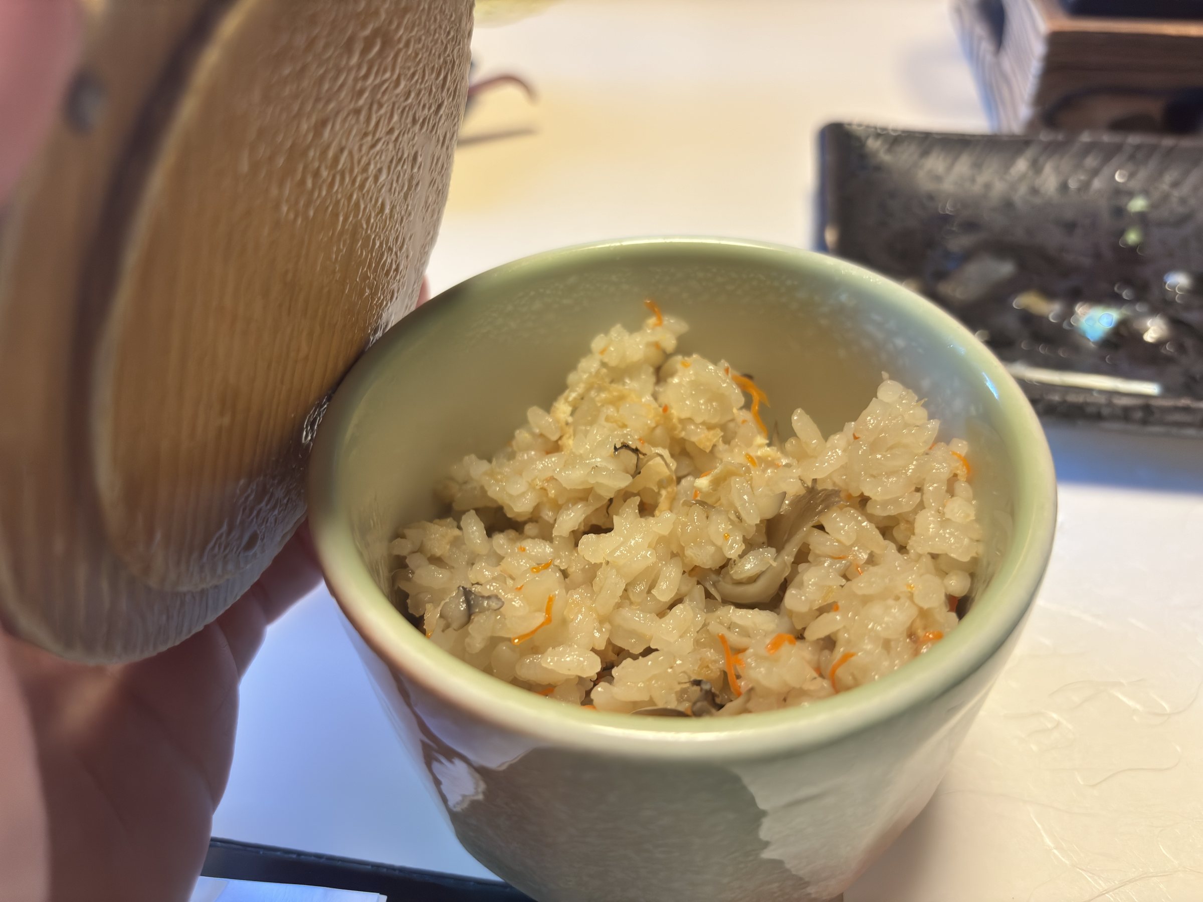 Takikomi gohan in a lidded bowl.