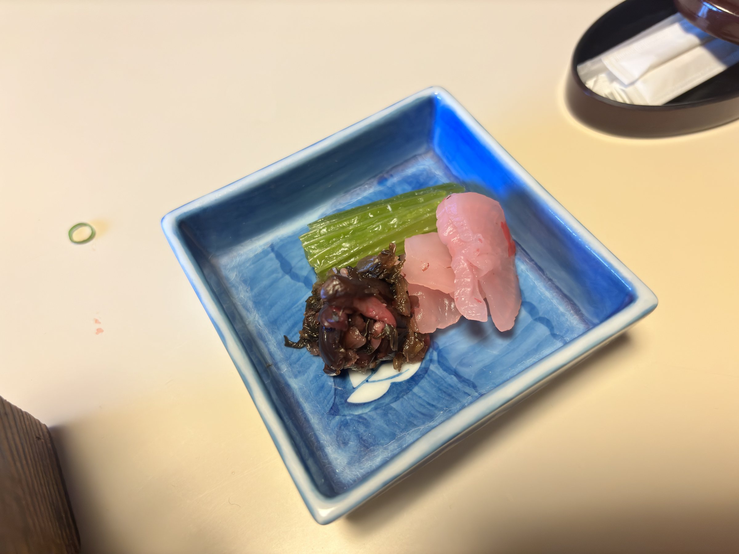 The plate of pickles, brought out after the meal.