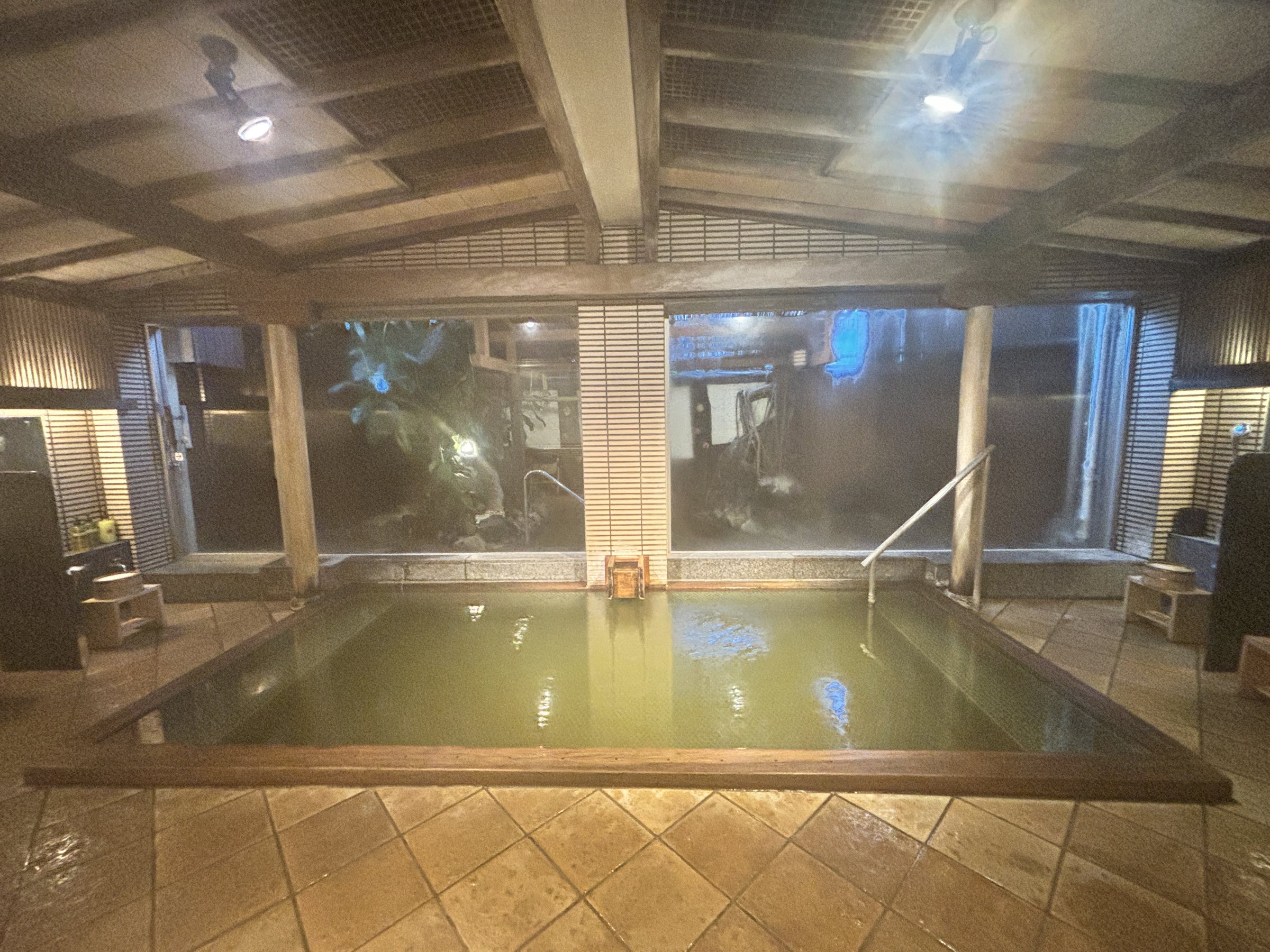 The large communal bath at night.