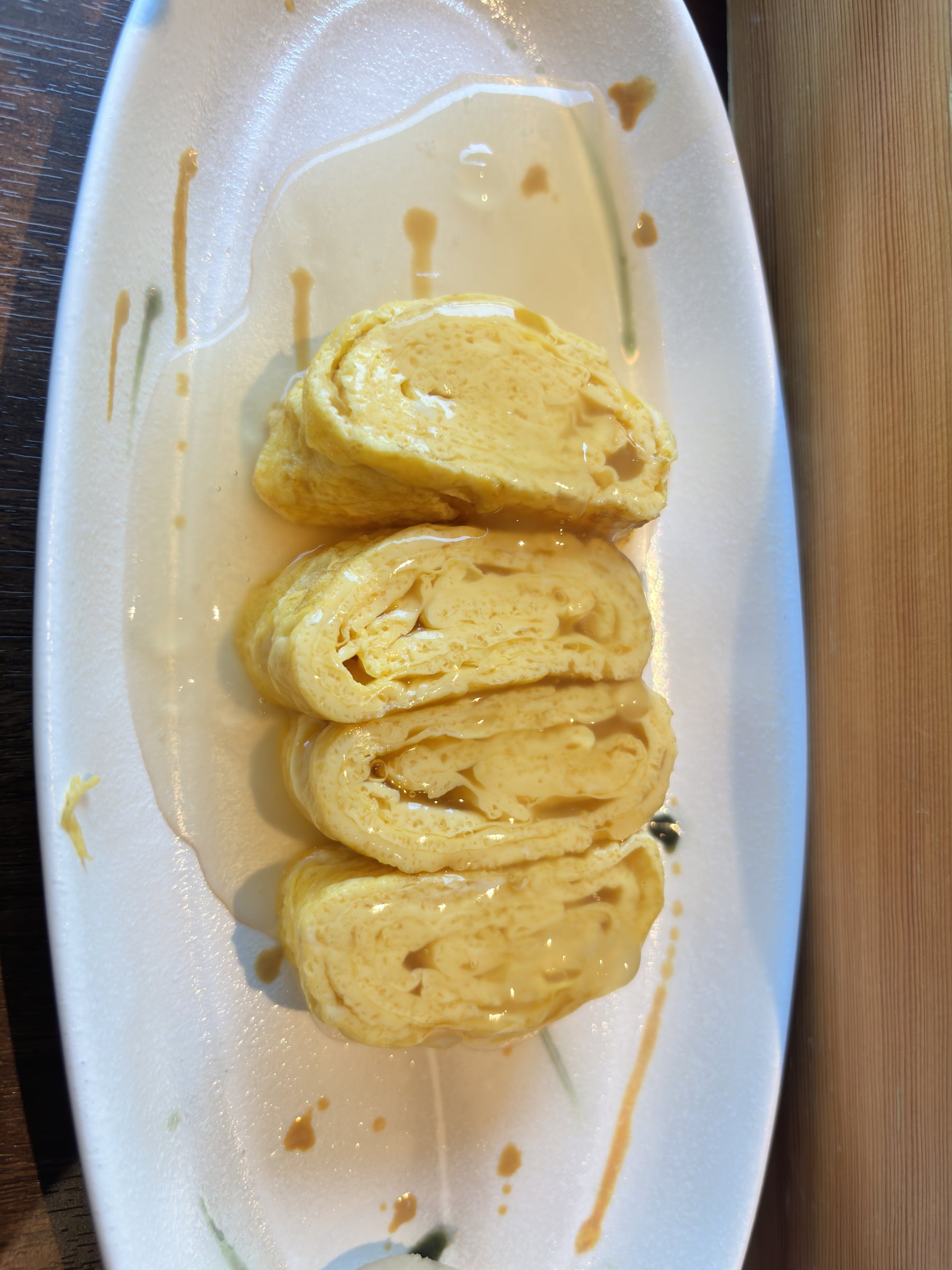 The rolled omelet, freshly cooked.