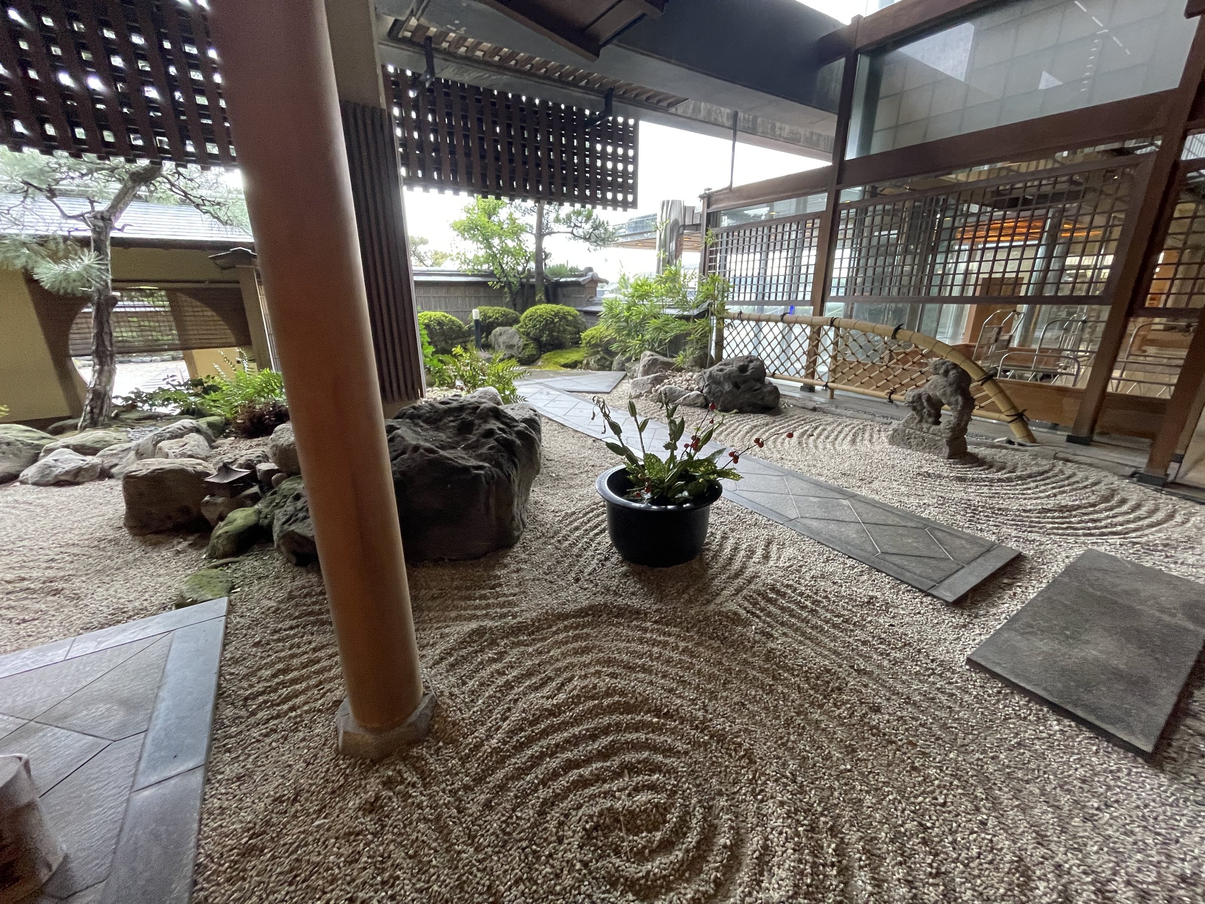 A dry landscape garden in a courtyard on the way to the baths.