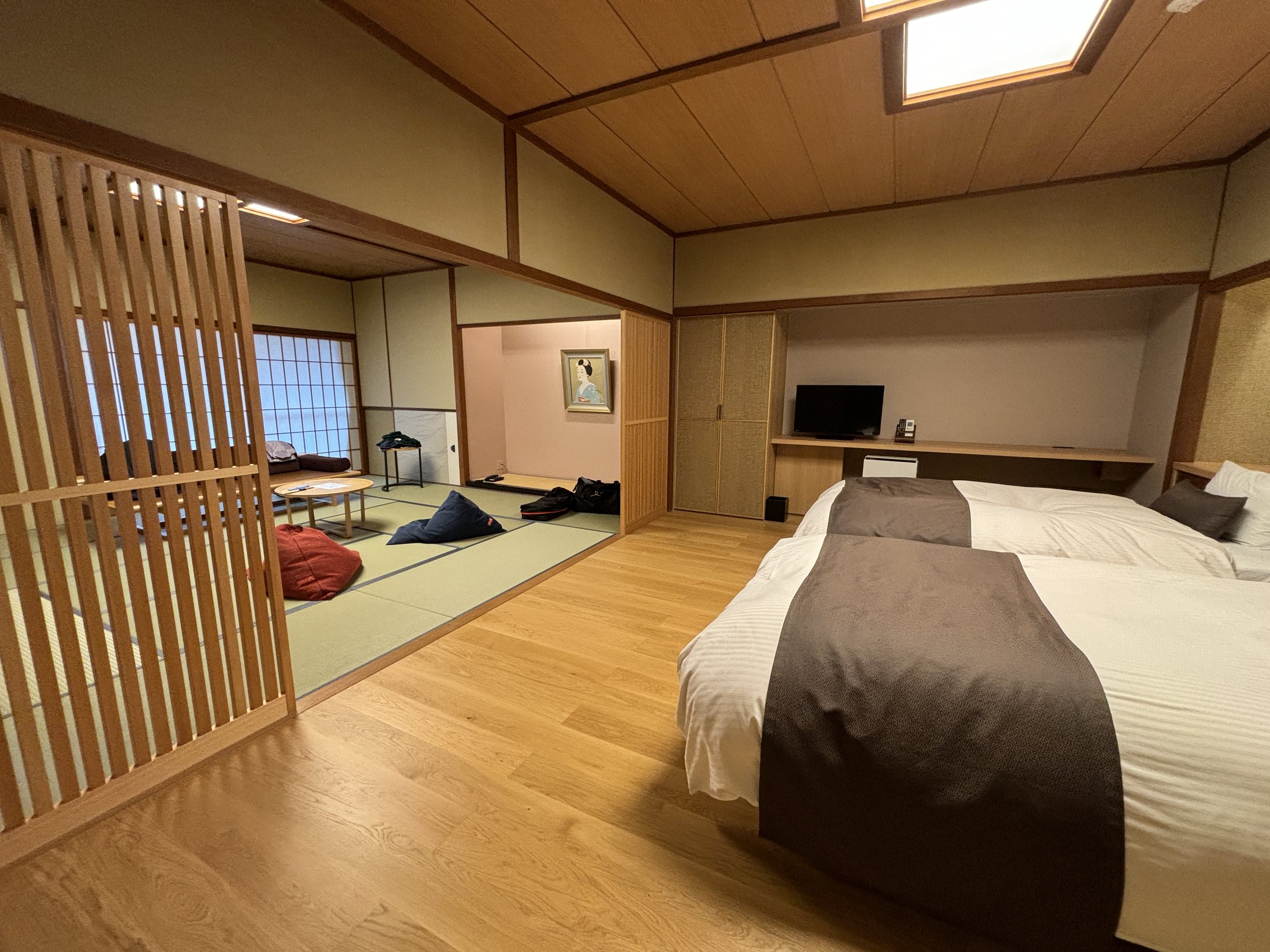 The room seen from behind a wooden lattice screen.