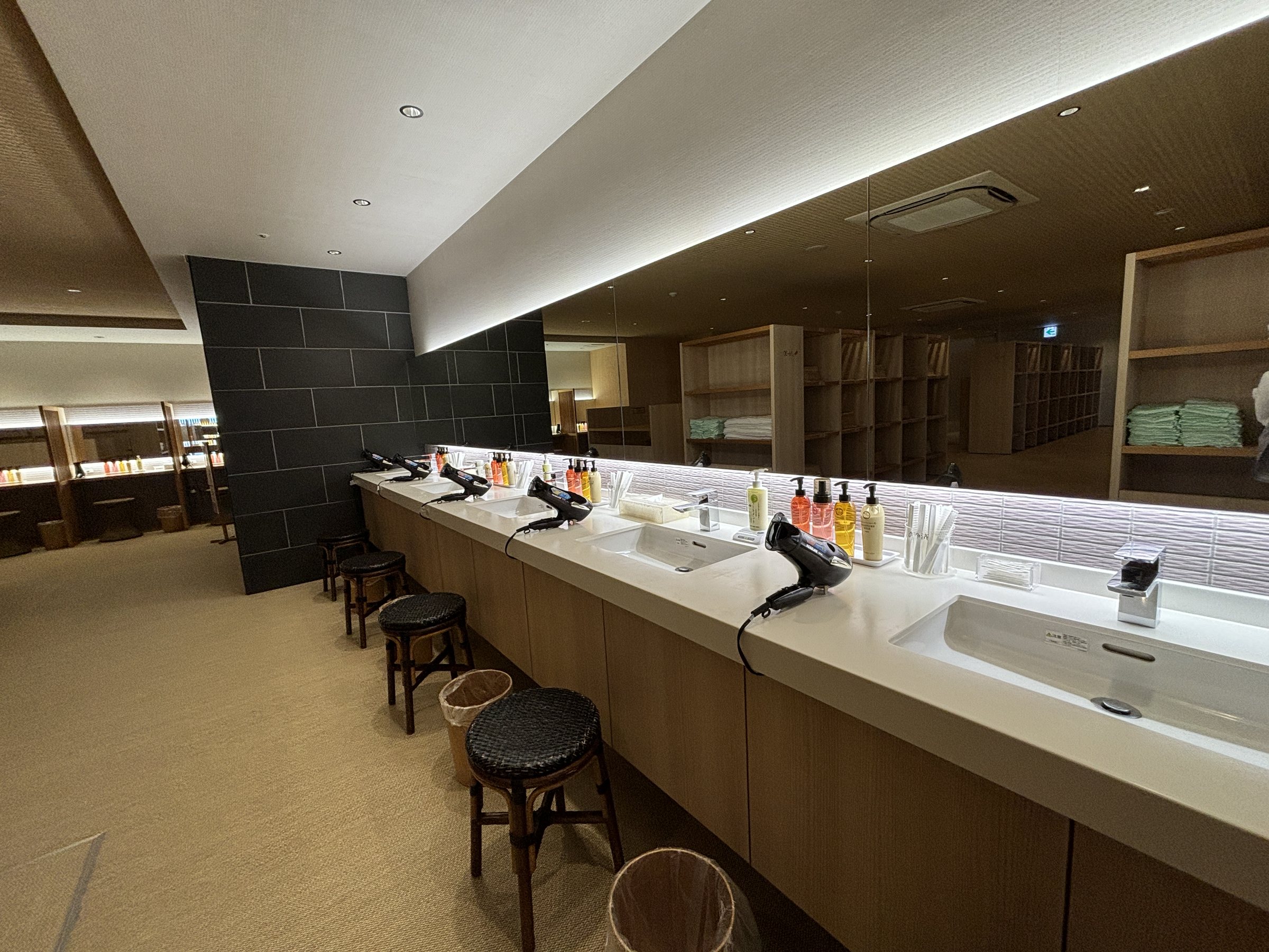 The vanity counter, with hairdryers neatly lined up.