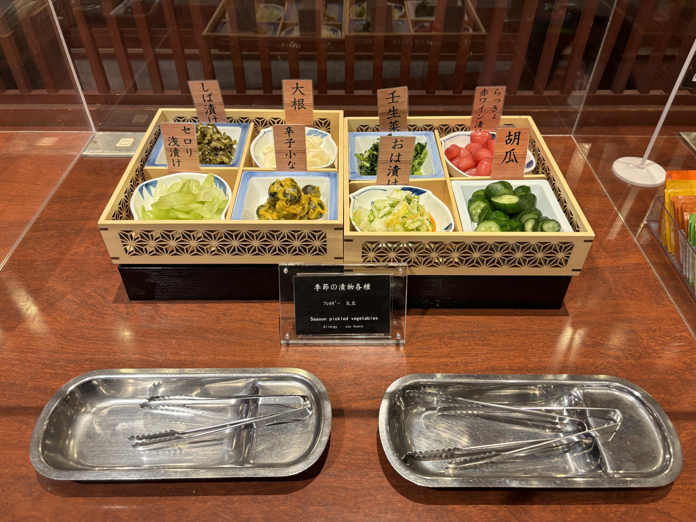 A second box of vegetable side dishes and pickles.