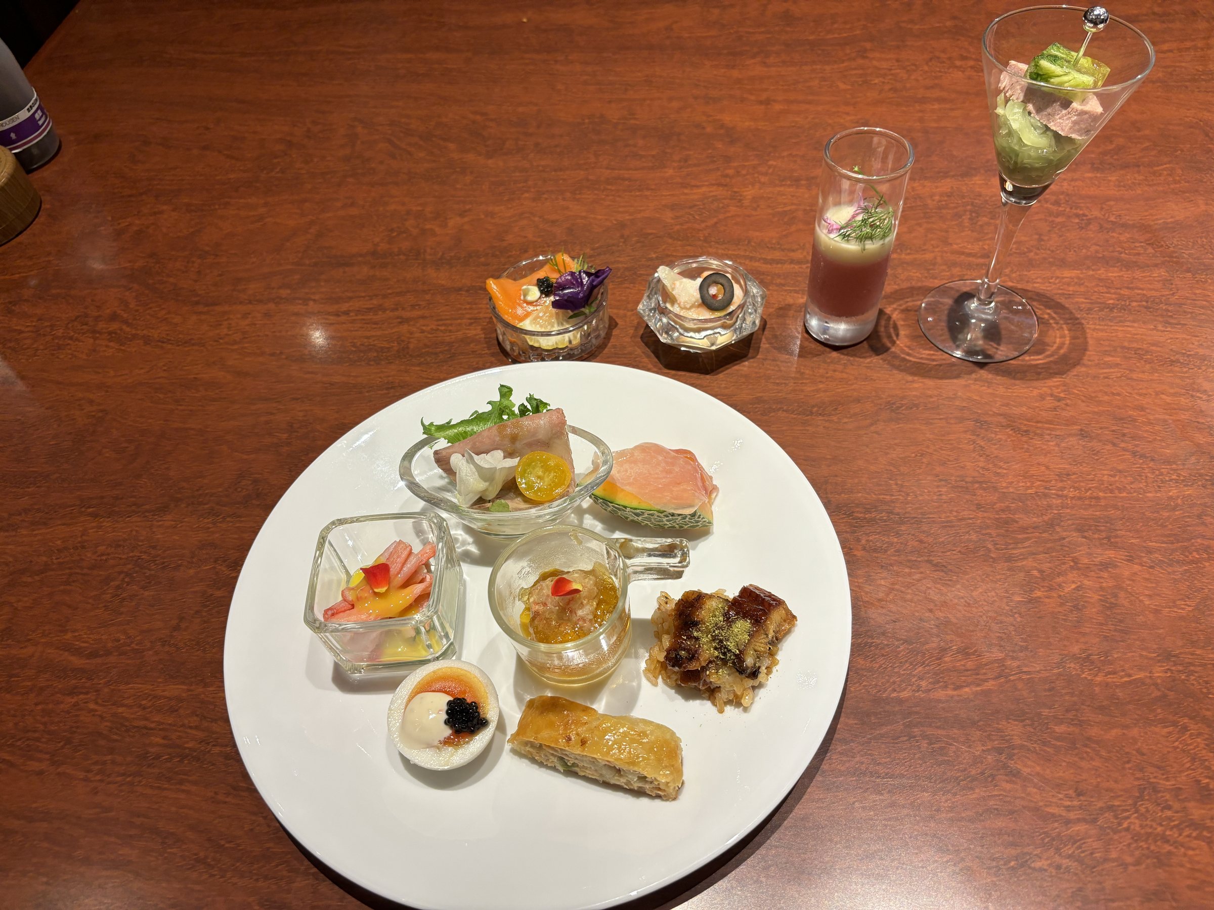 Our plate of small starters, with a parfait glass.