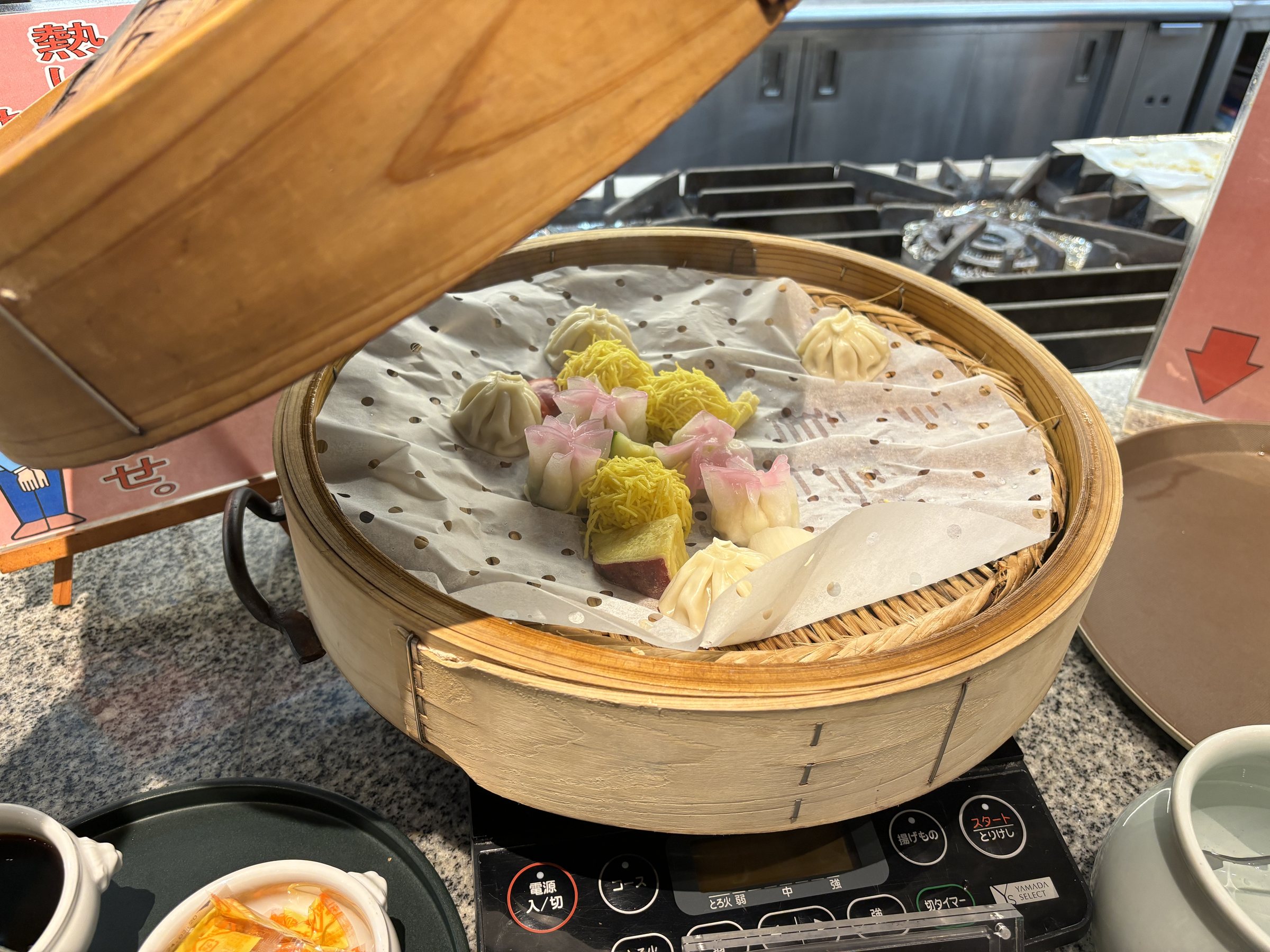 Dumplings in a bamboo steamer.