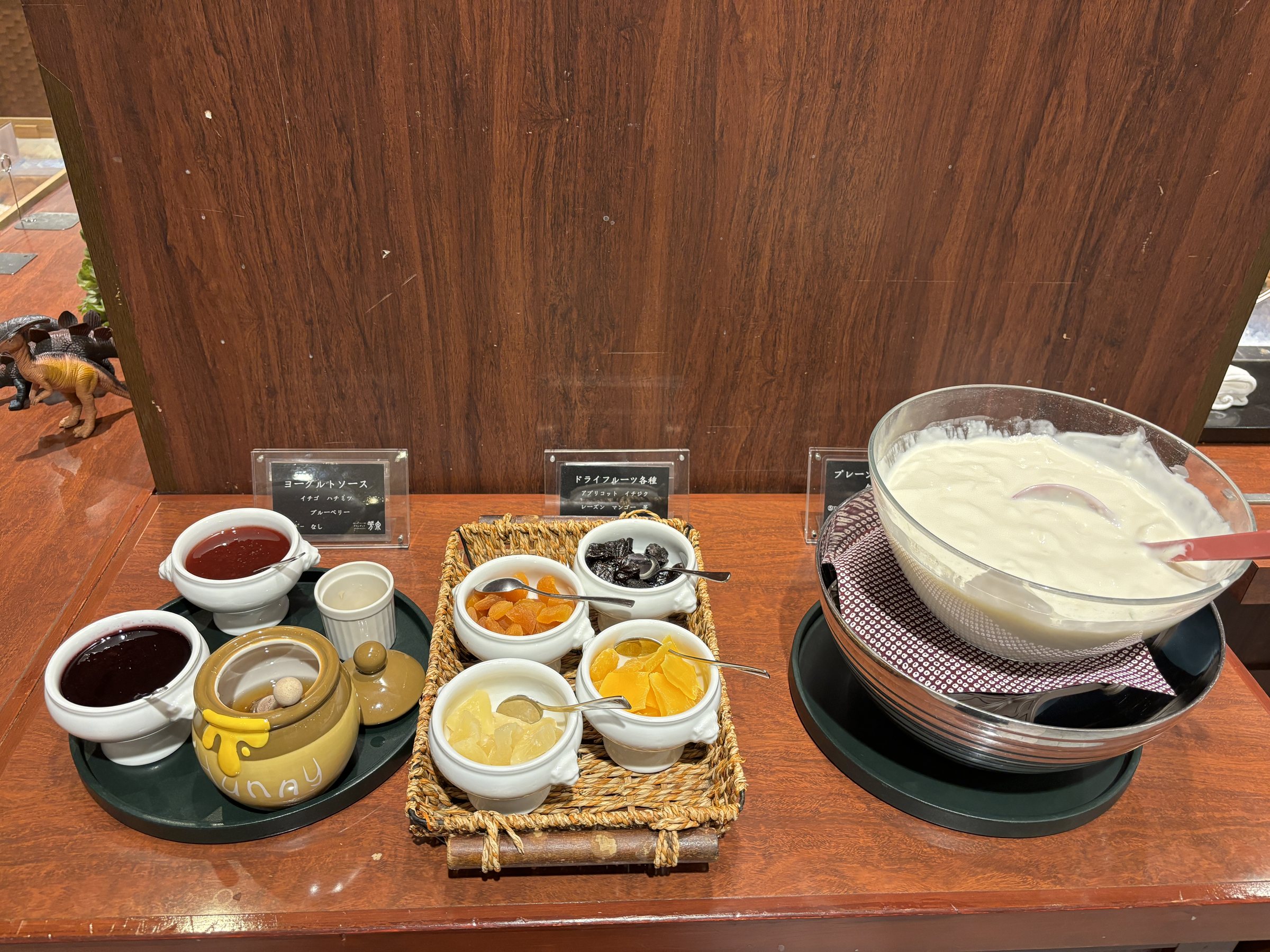 Yogurt with jams and toppings.