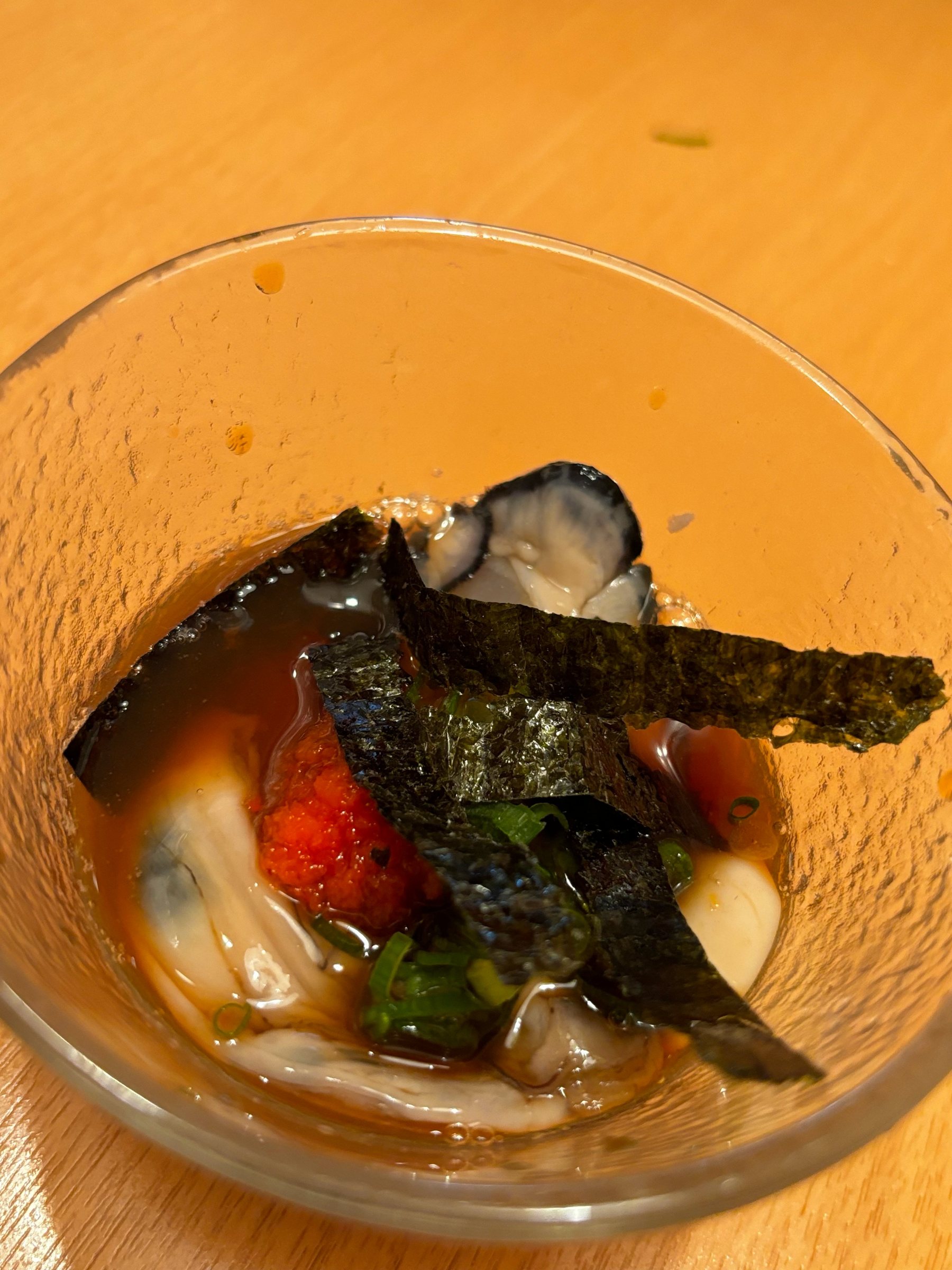 Oysters in ponzu with momiji-oroshi and nori.