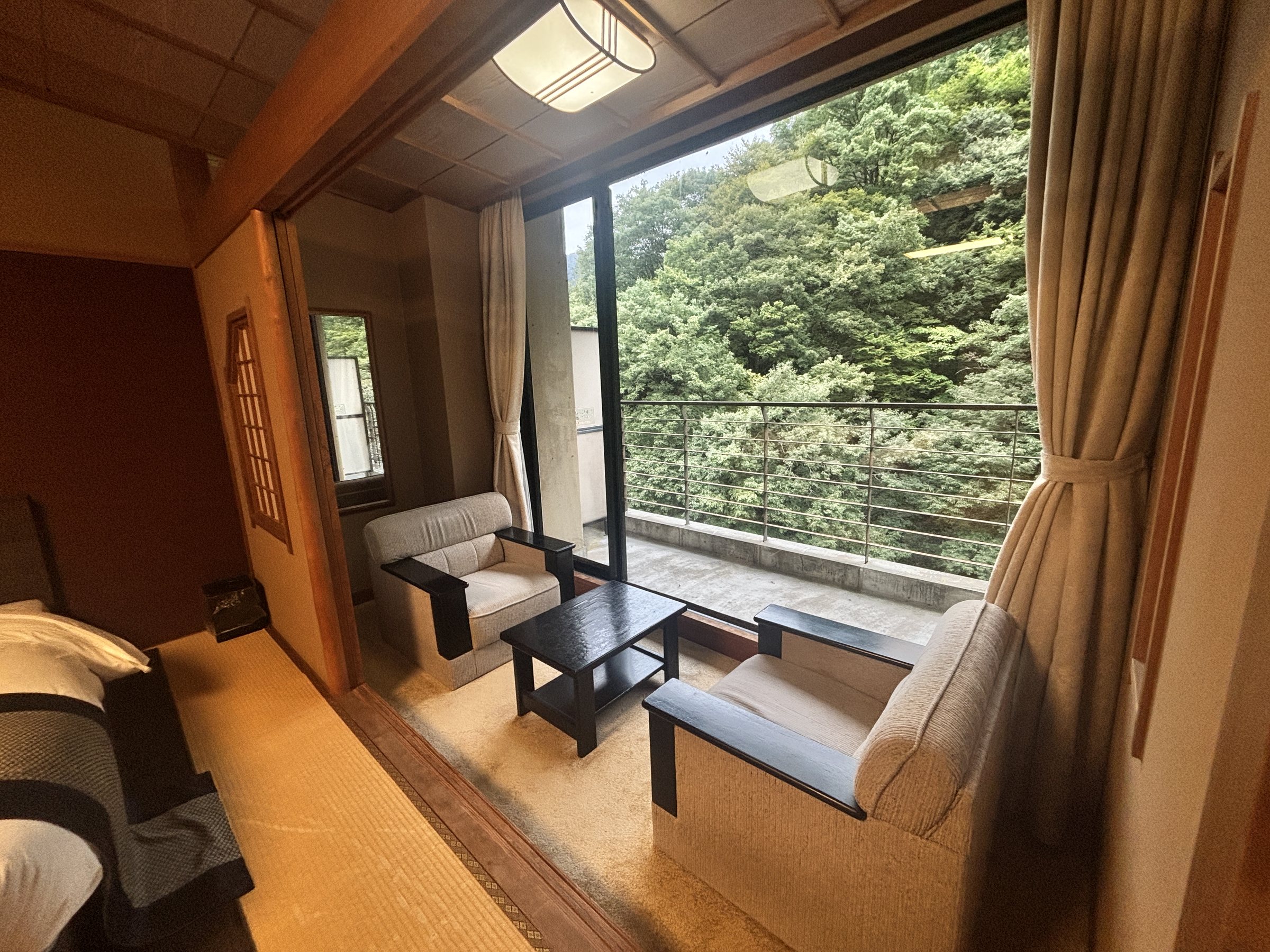 The window seating area, with two chairs and a small table.