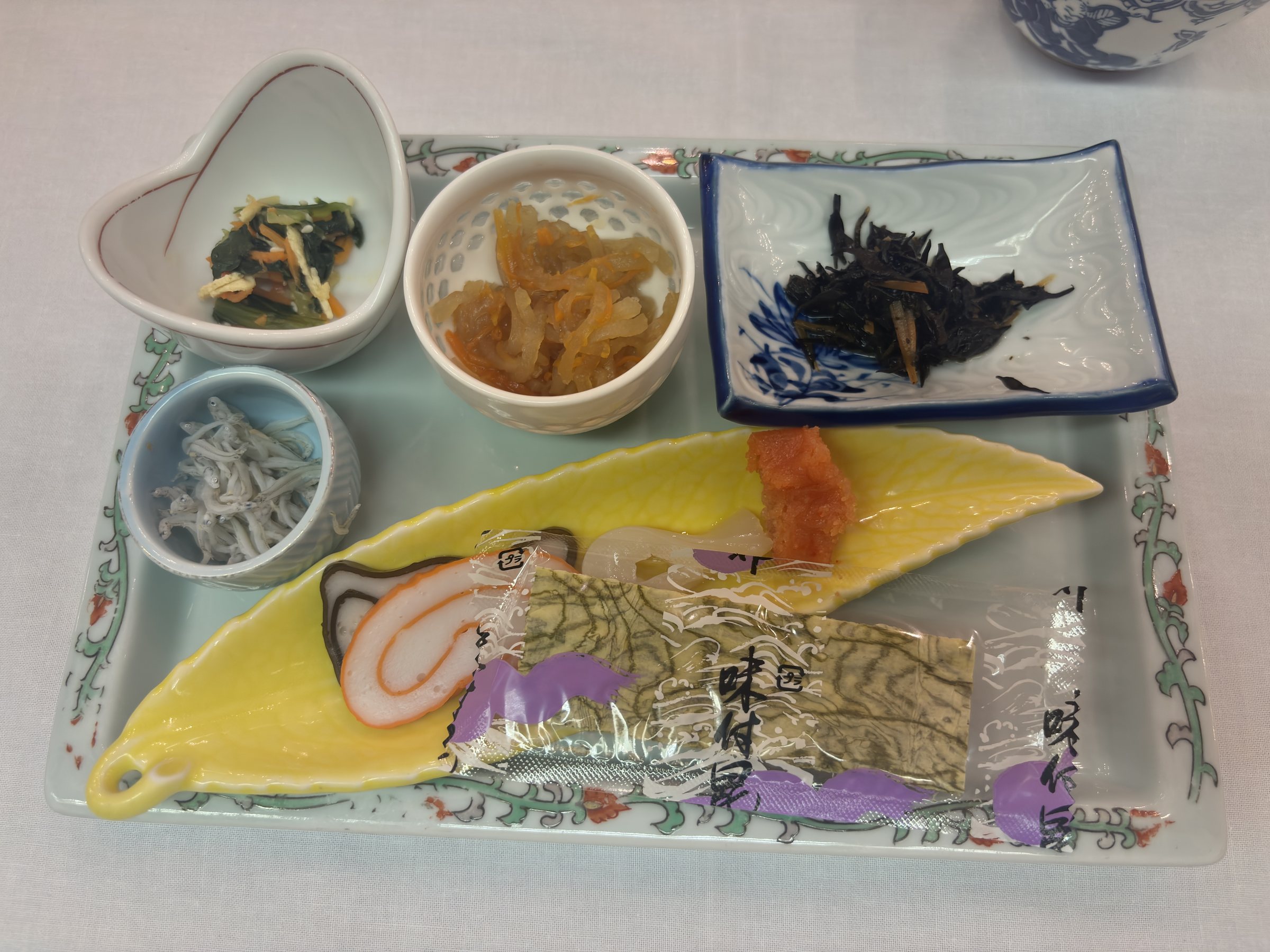A breakfast plate of small side dishes.