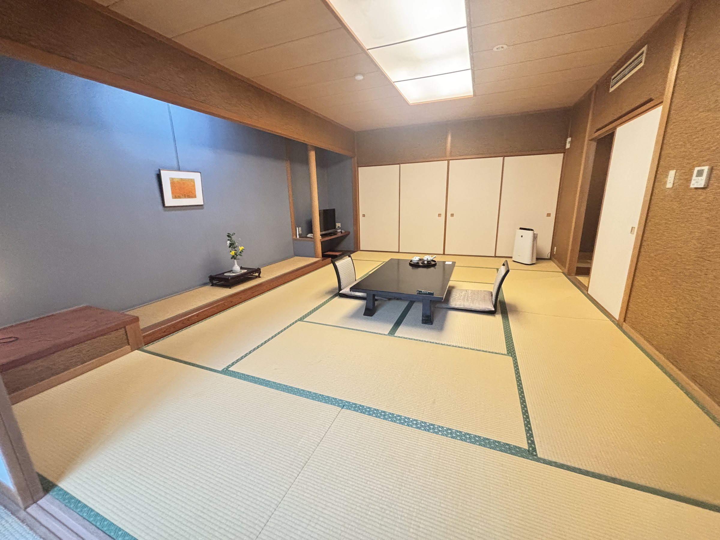 The guest room: a broad tatami space with a low table.