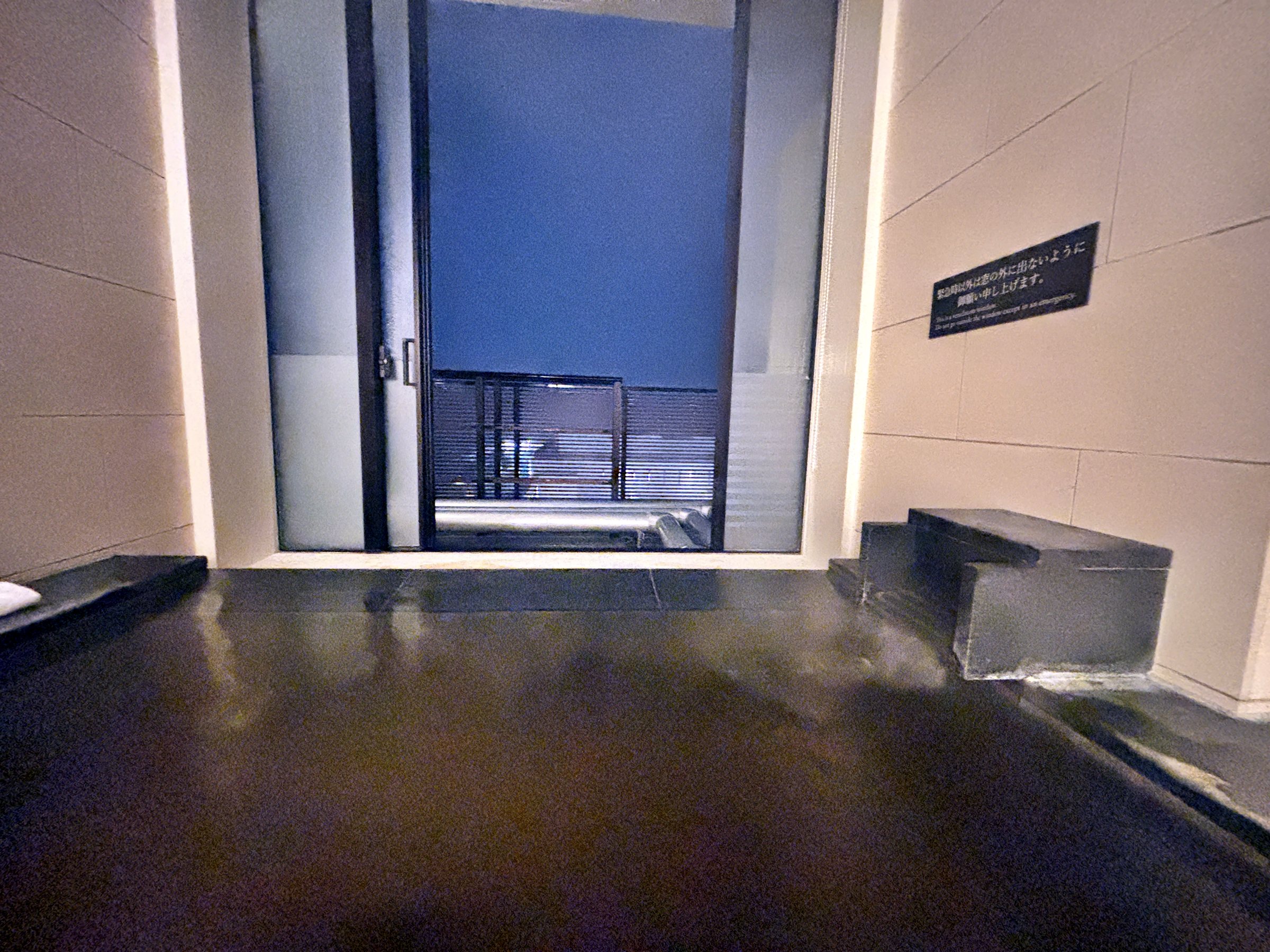 The in-room bath at night.